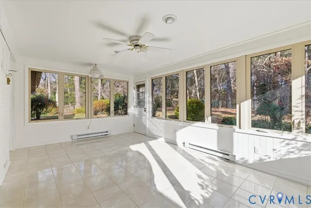 a view of large windows with a swimming pool