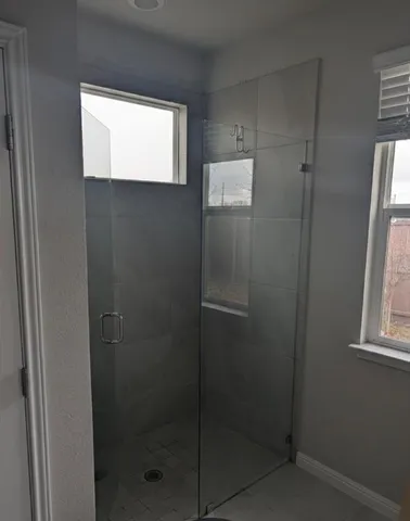 a bathroom with a sink toilet and a mirror