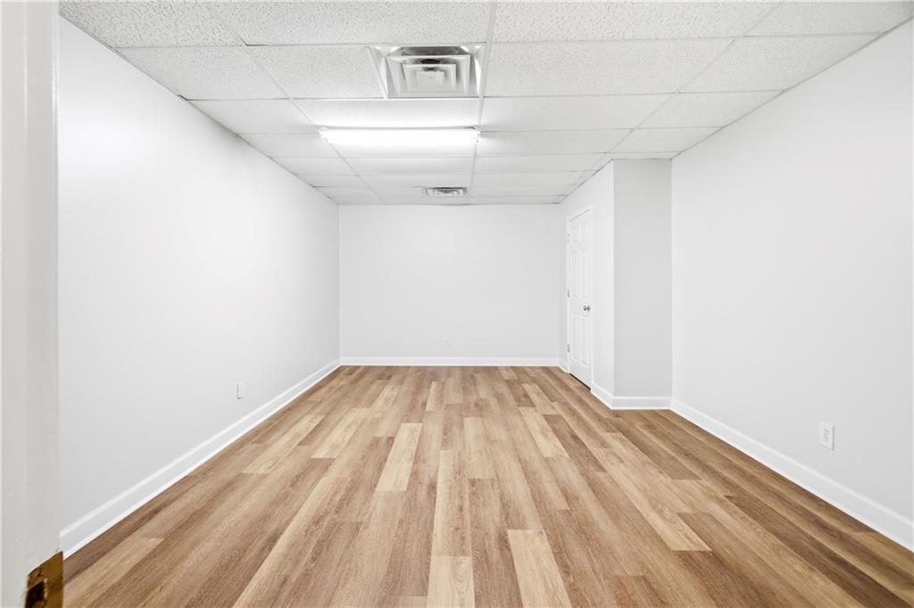 110 Mayes Farm Road Northwest Marietta, GA 30064 - Photo 38 of 49 a view of empty room with wooden floor