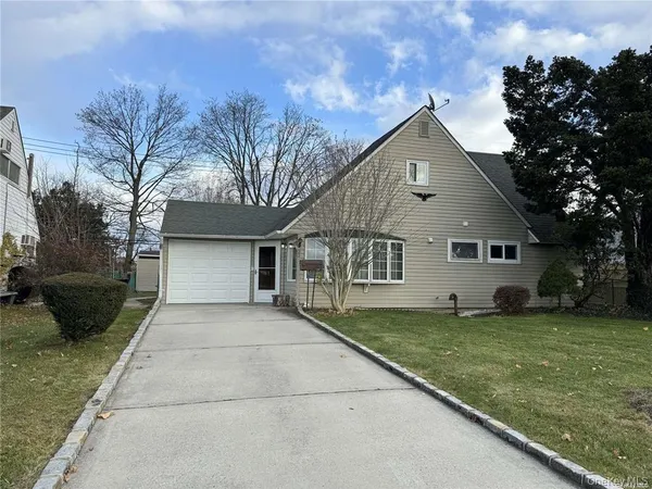 a house view with a garden space