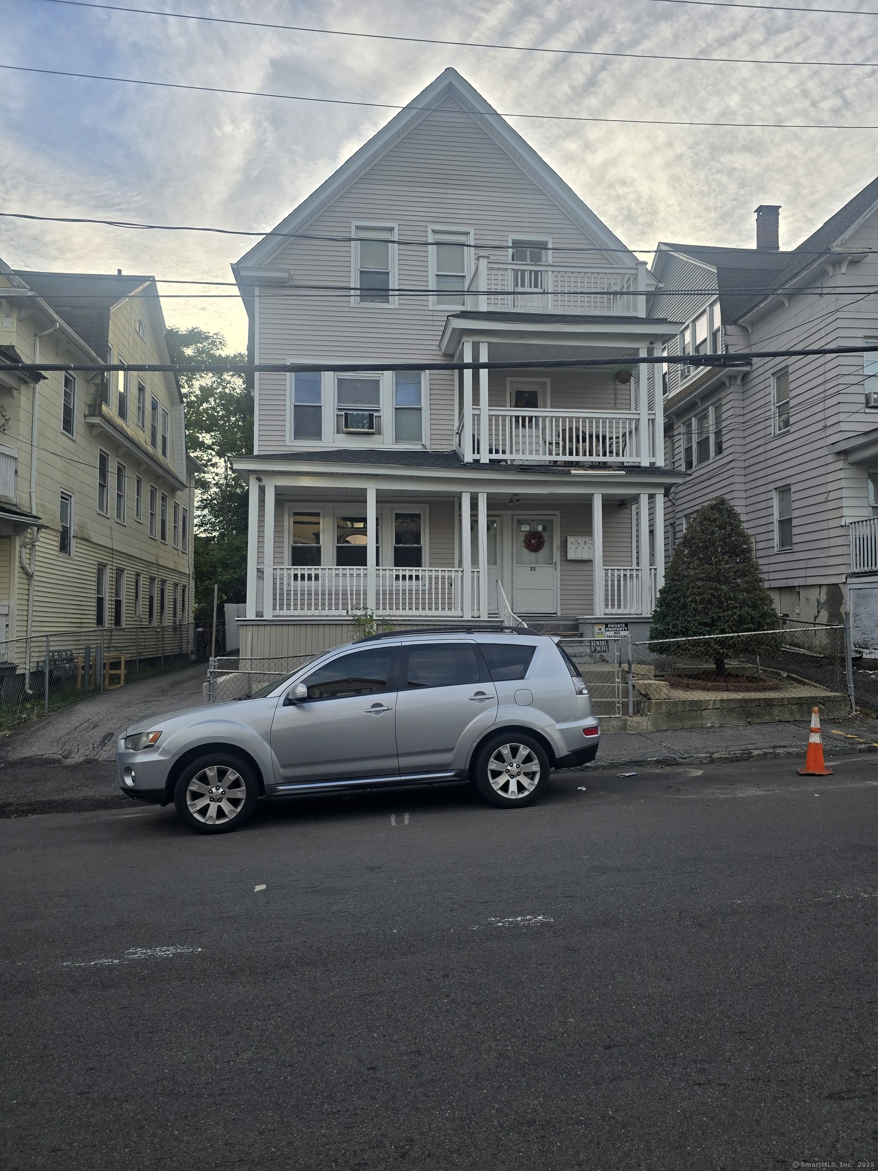 a car parked in front of a house