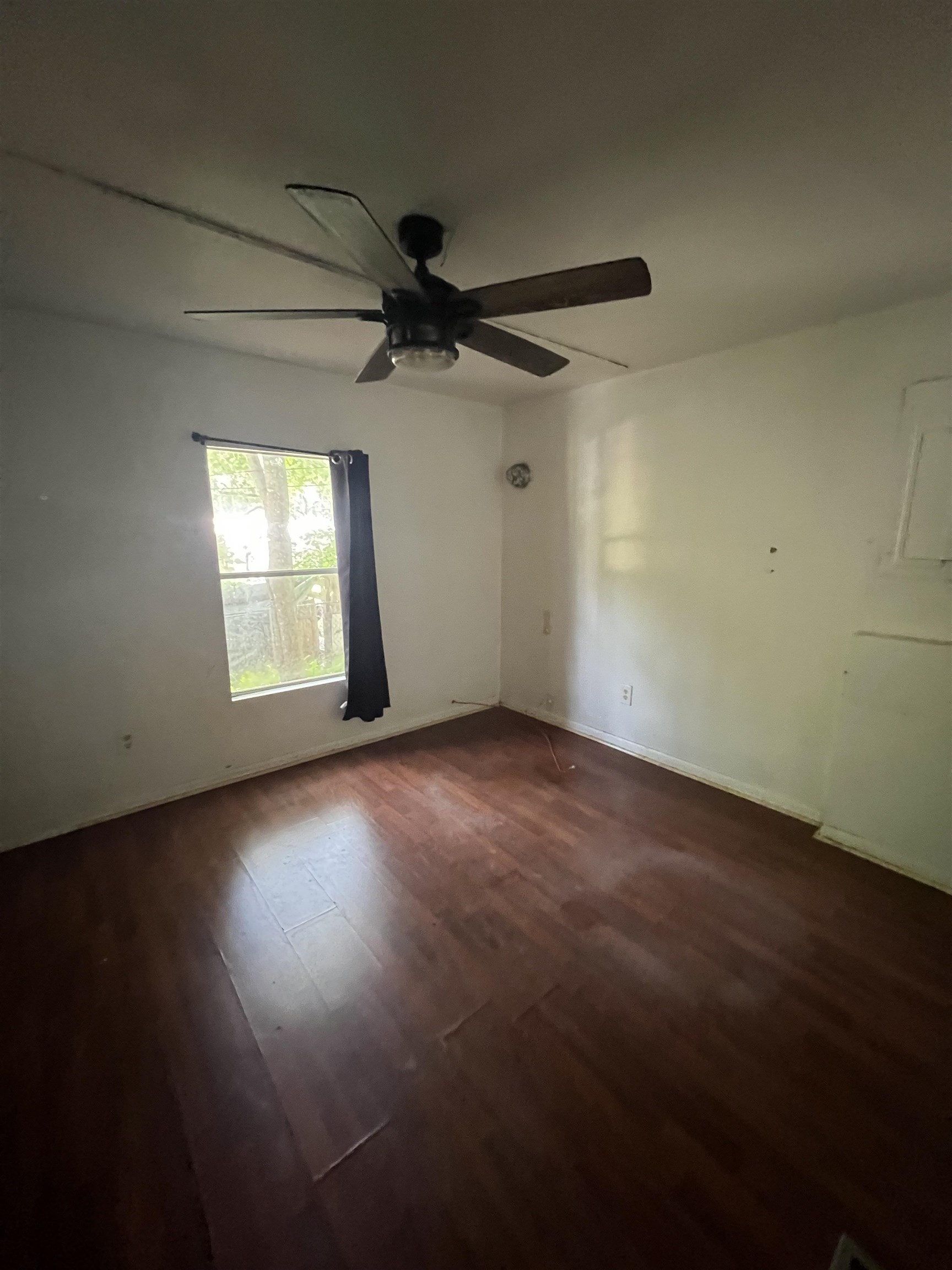 6473 Capri Isle St. Augustine, FL 32095 - Photo 7 of 7 an empty room with a empty space and windows