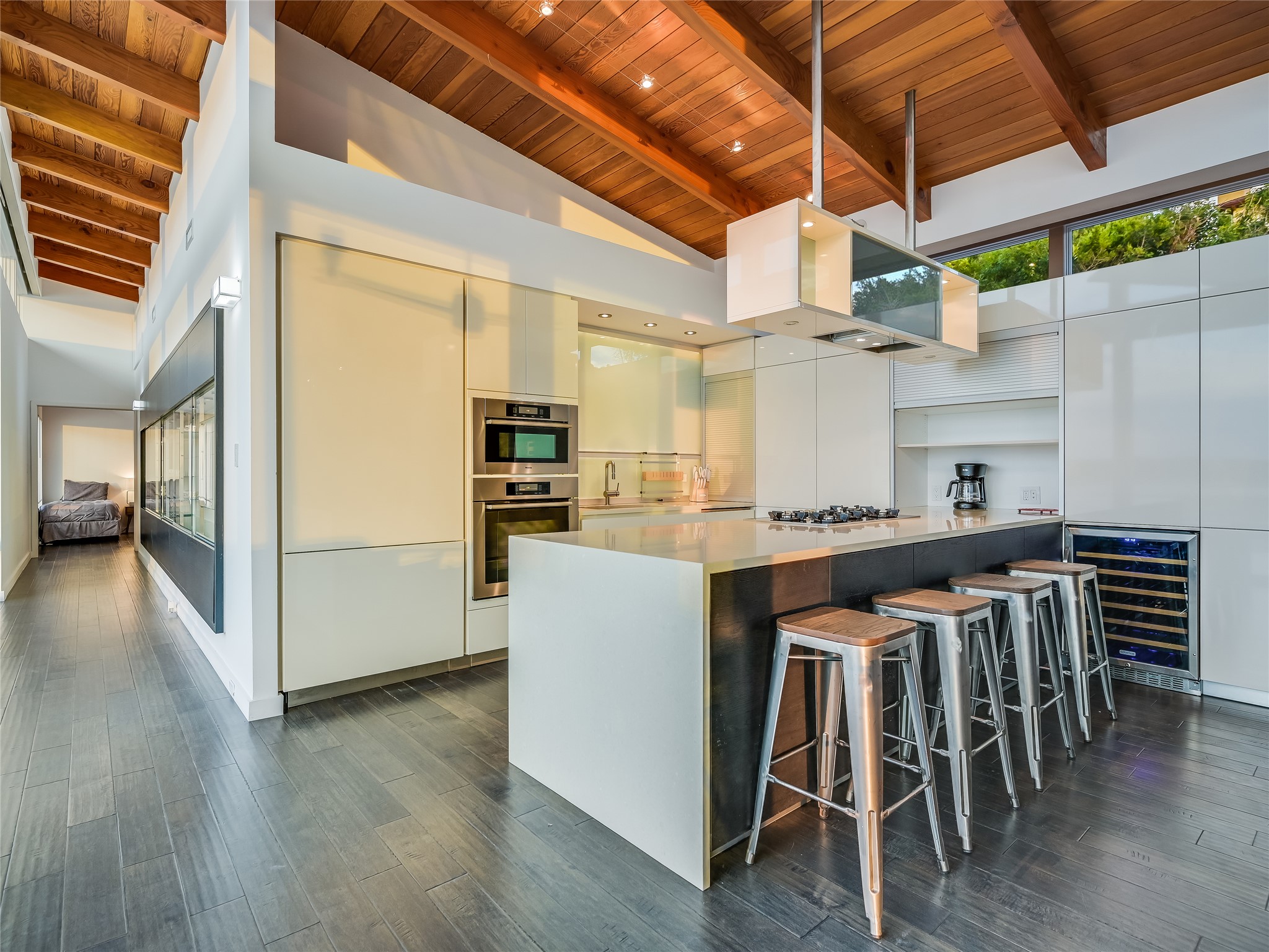 1500 Buffalo Gap Road Austin, TX 78734 - Photo 11 of 38 a kitchen with a table chairs refrigerator and wooden floor