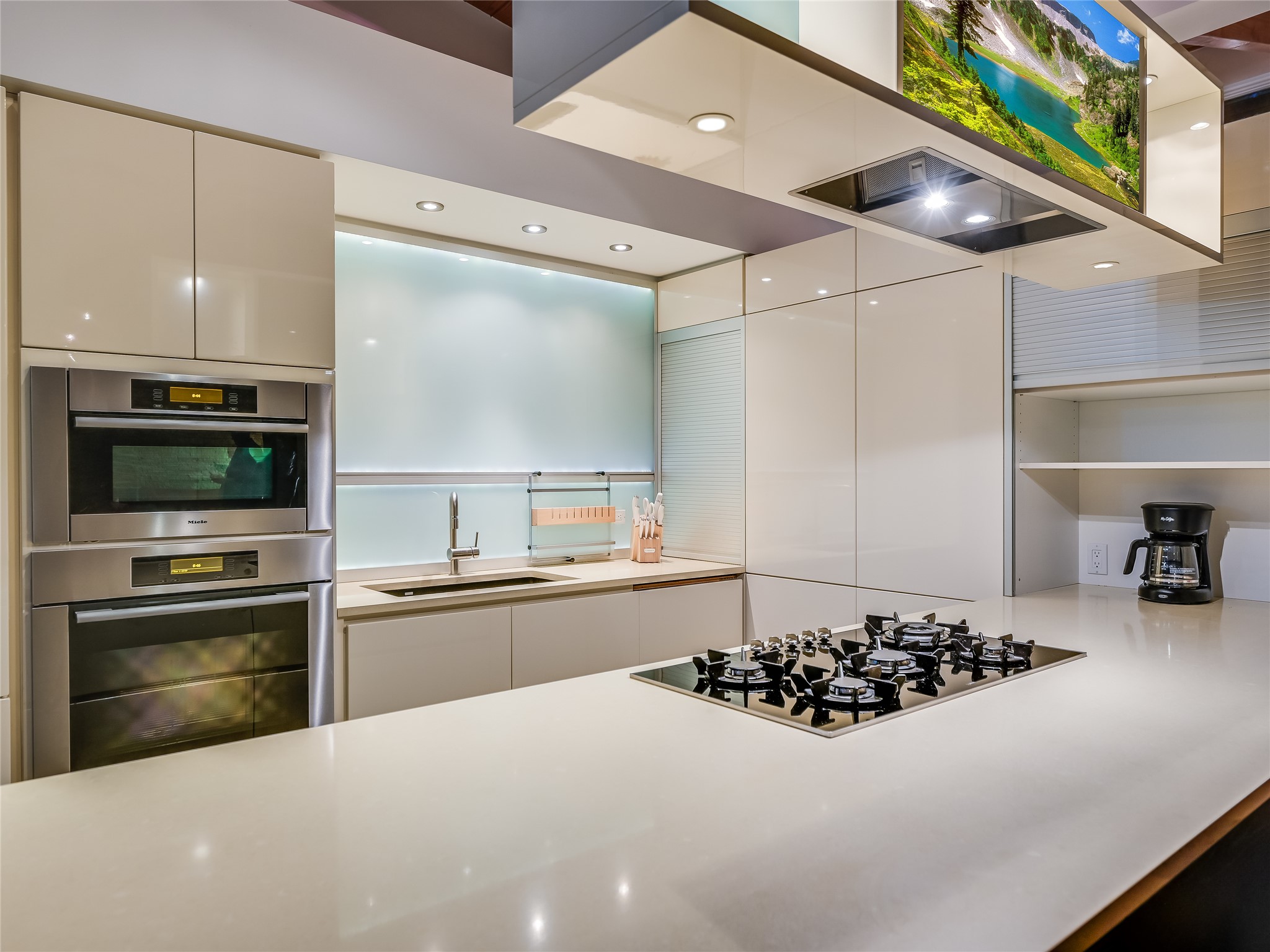 1500 Buffalo Gap Road Austin, TX 78734 - Photo 12 of 38 a kitchen with a sink and a stove top oven