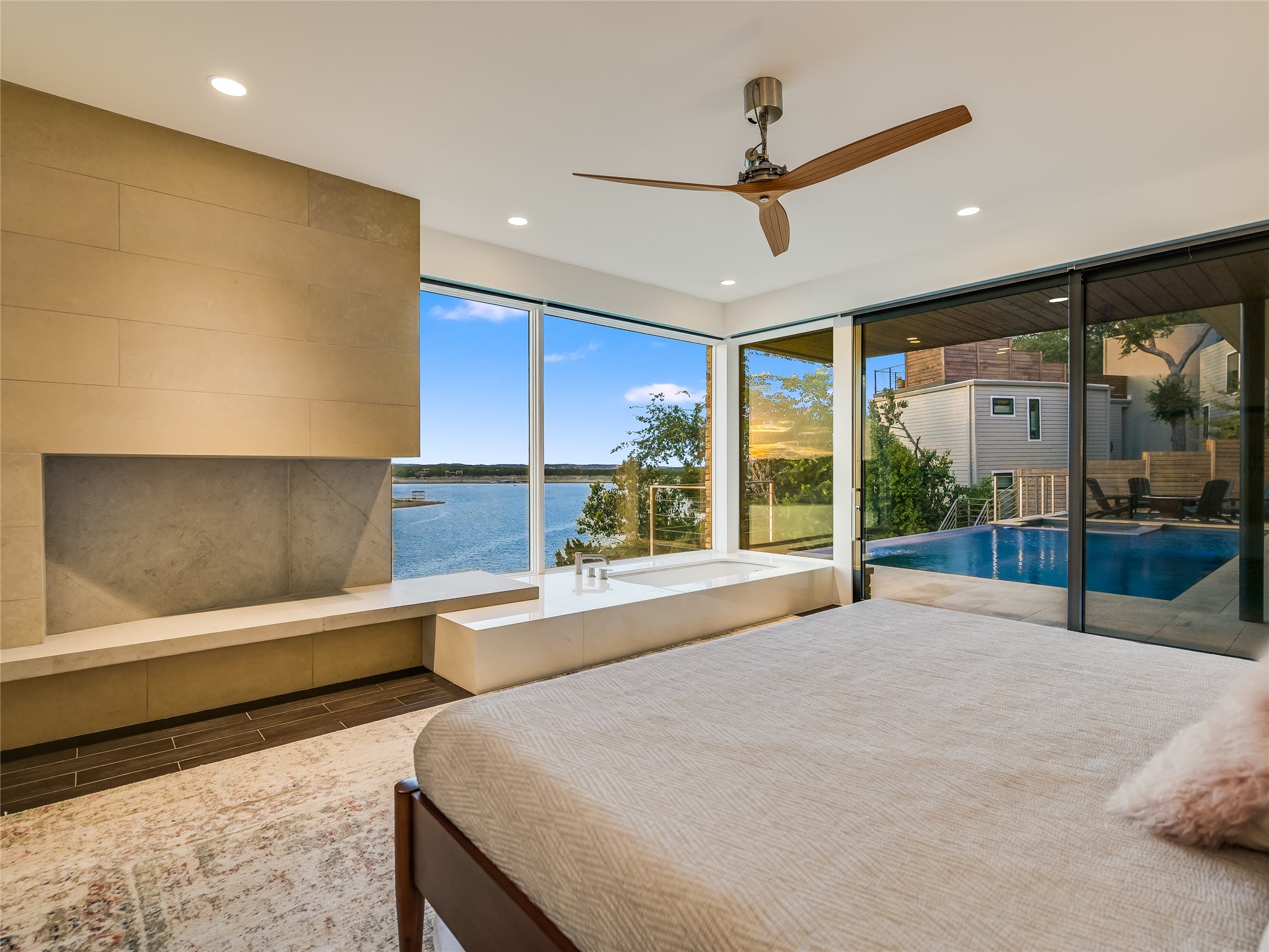 1500 Buffalo Gap Road Austin, TX 78734 - Photo 17 of 38 a spacious bedroom with a large bed and a large window