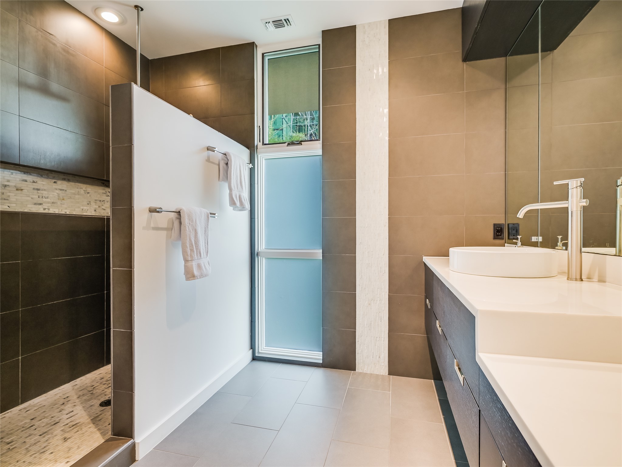 1500 Buffalo Gap Road Austin, TX 78734 - Photo 21 of 38 a bathroom with a sink and a mirror