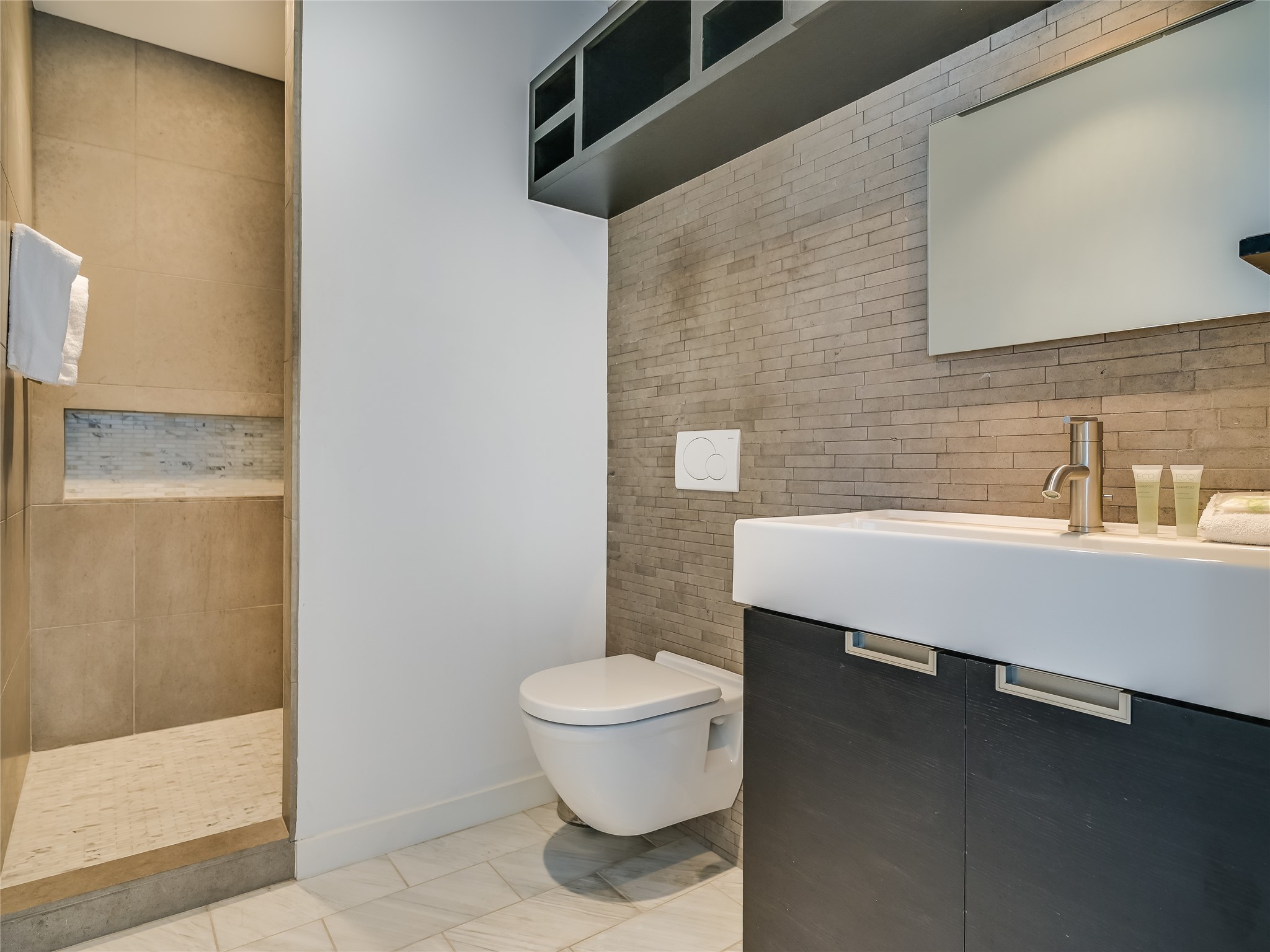 1500 Buffalo Gap Road Austin, TX 78734 - Photo 22 of 38 a bathroom with a sink a toilet and shower