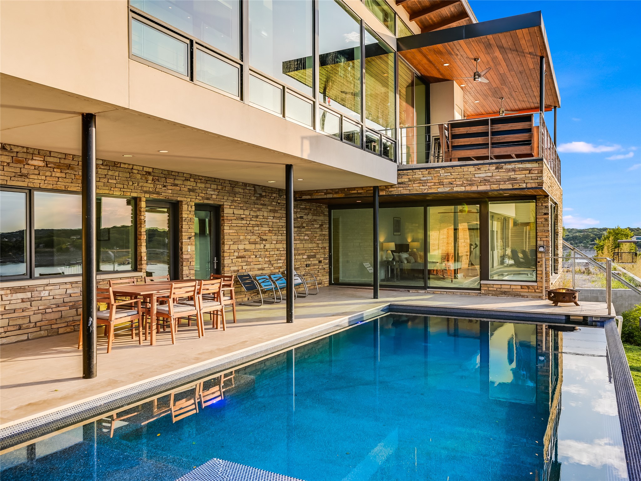 1500 Buffalo Gap Road Austin, TX 78734 - Photo 24 of 38 a swimming pool with table and chairs