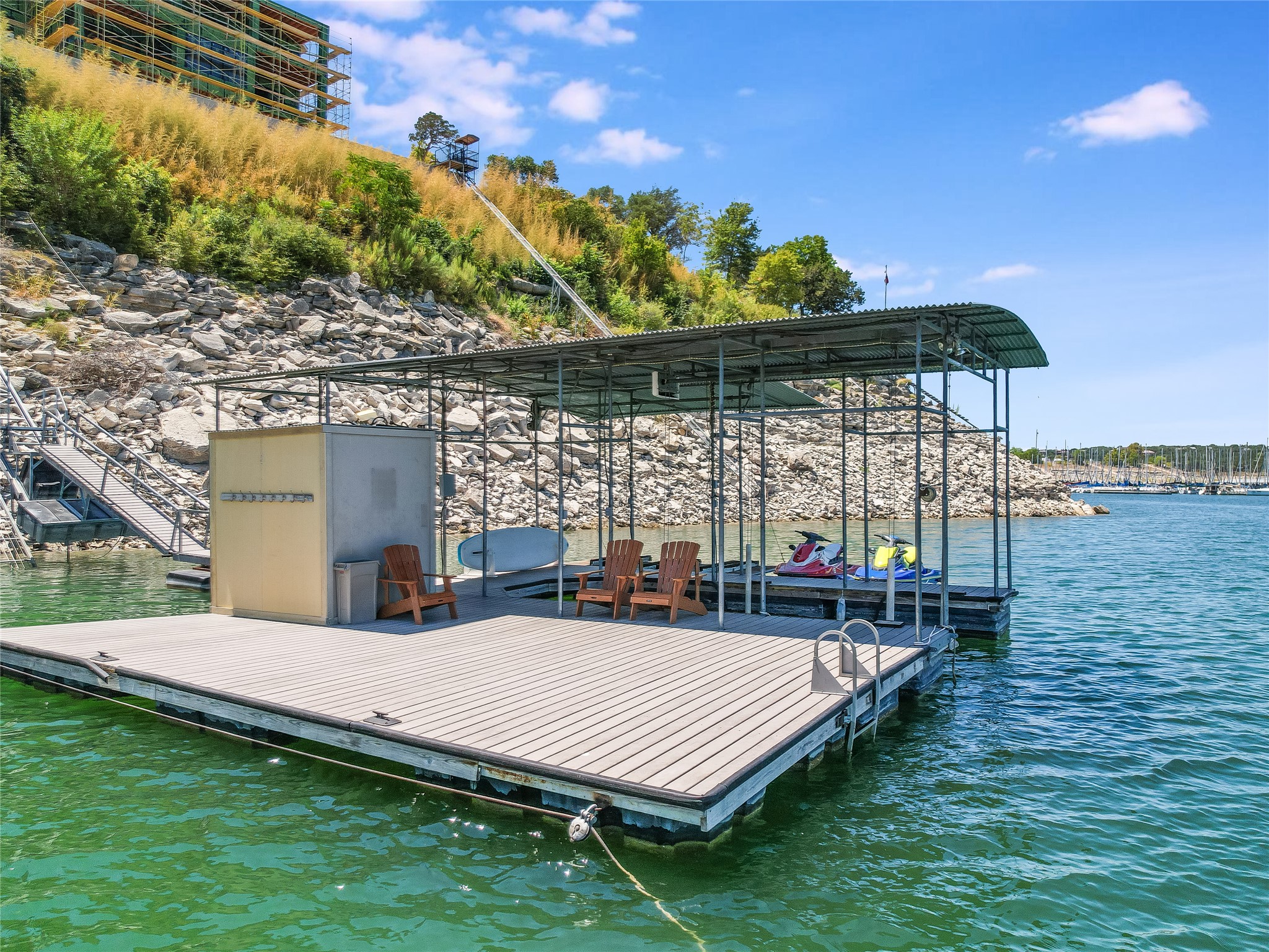 1500 Buffalo Gap Road Austin, TX 78734 - Photo 35 of 38 a view of a patio with a table and chairs under an umbrella