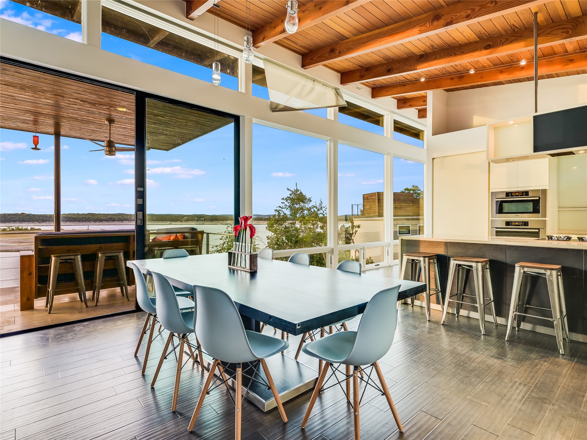 1500 Buffalo Gap Road Austin, TX 78734 - Photo 9 of 38 a view of a dining room with furniture window and wooden floor