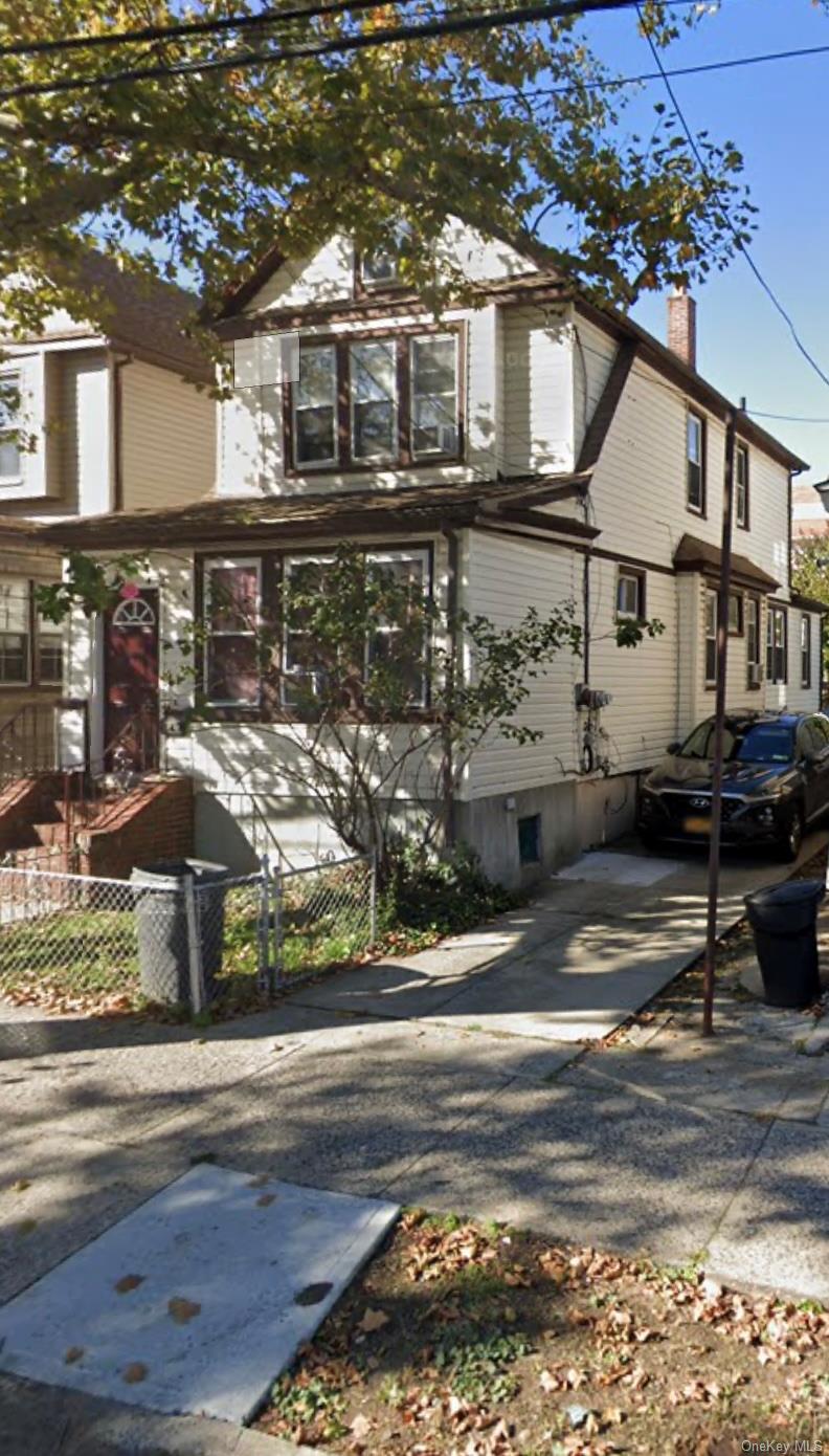 a front view of a house with street