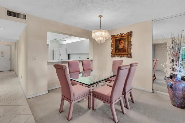 a living room with furniture and large window