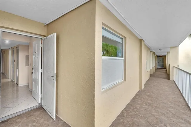 a bathroom with a shower and a sink