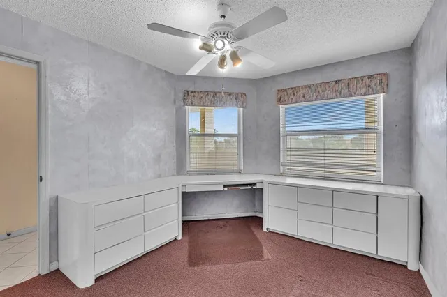 a view of a dining room with furniture wooden floor and chandelier