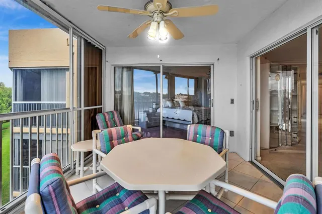 a view of a living room and kitchen