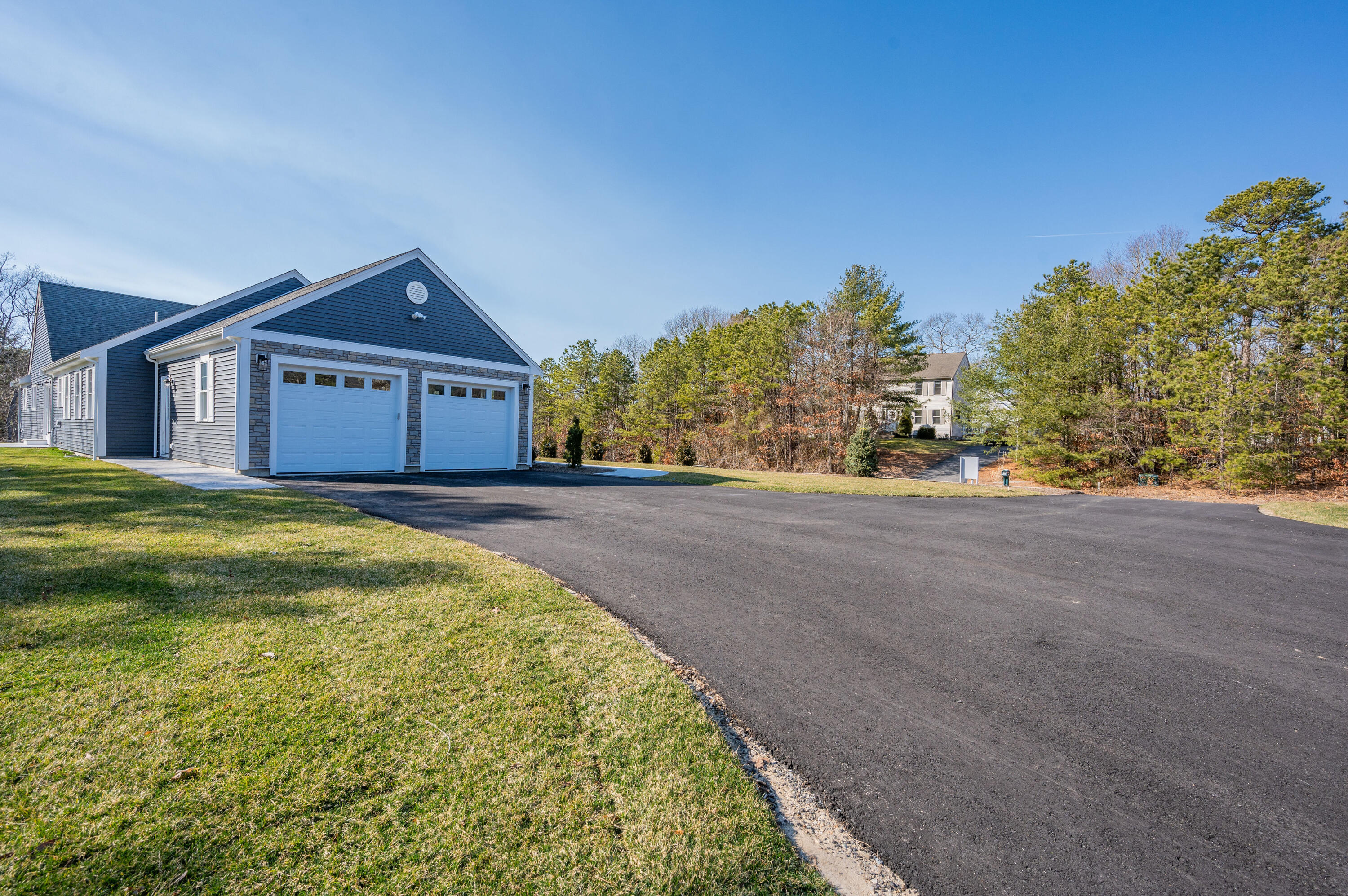 17 Silver Leaf Lane Mashpee, MA 02649 - Photo 32 of 33 17 Silver Leaf Side Garage