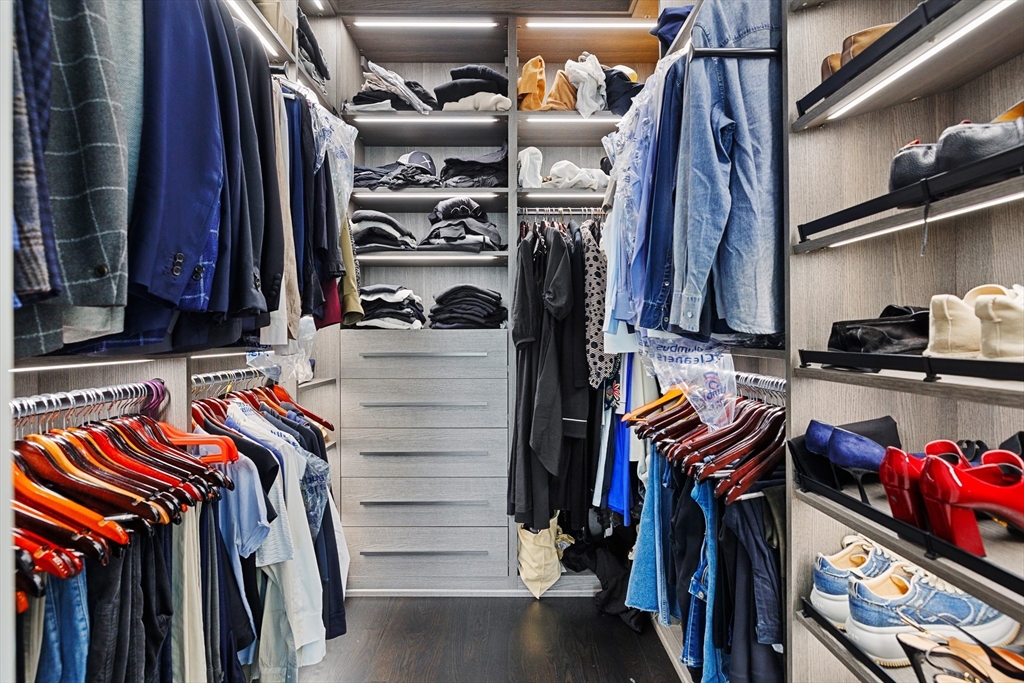 8 Rutland Square, Unit 2 Boston, MA 02118 - Photo 21 of 30 a view of walk in closet with clothes and shoes