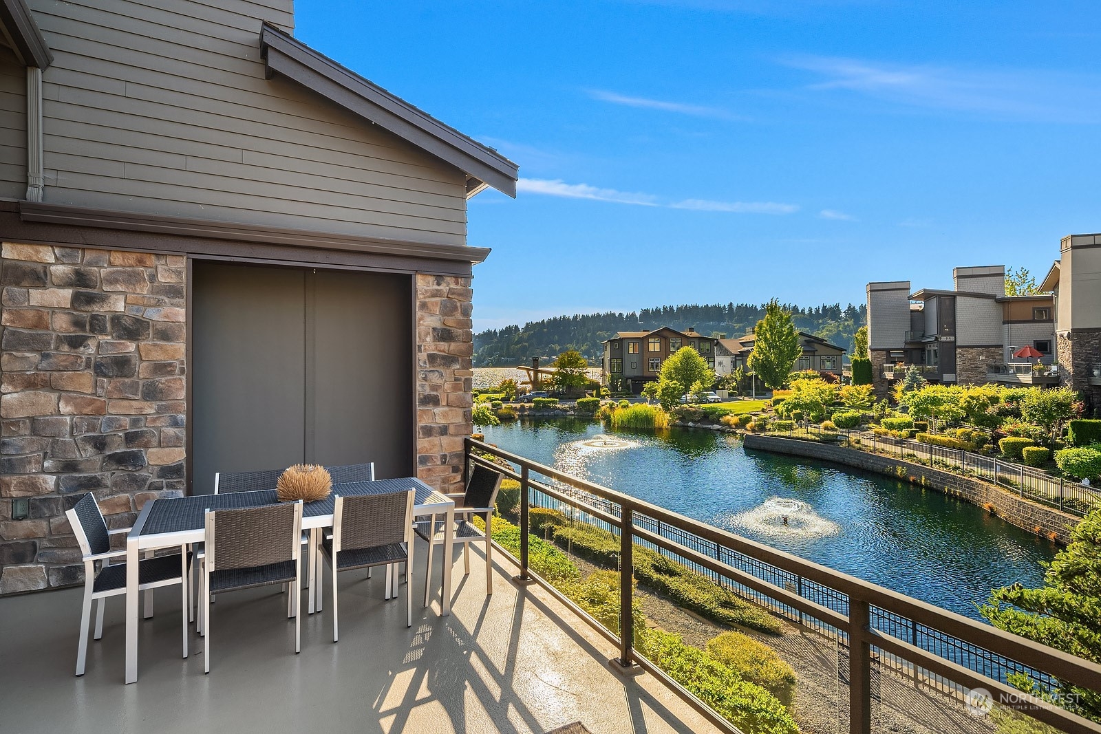 1104 North 41st Place Renton, WA 98056 - Photo 15 of 40 a view of a chairs and table in a balcony