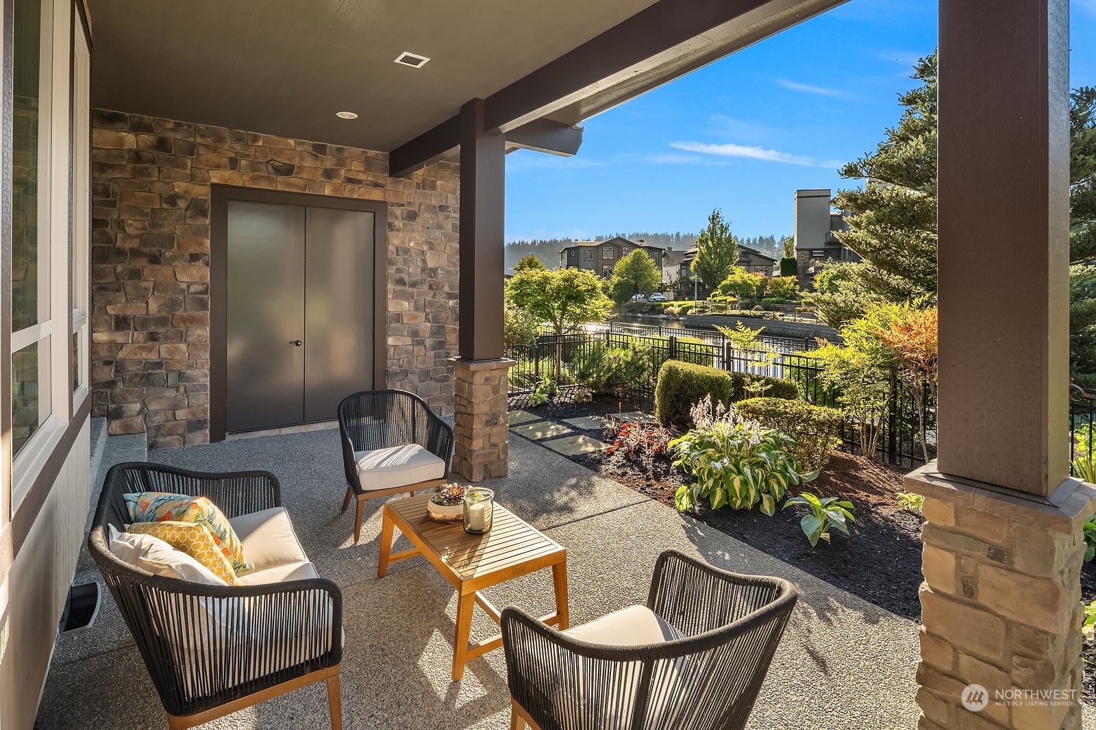 1104 North 41st Place Renton, WA 98056 - Photo 29 of 40 a outdoor living space with furniture and a potted plant
