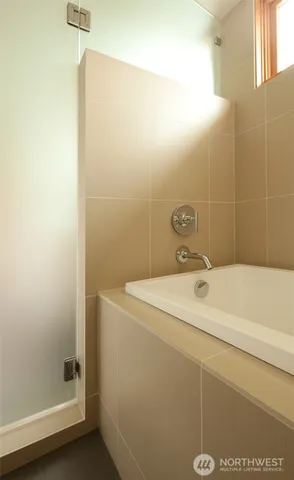 a bathroom with a sink and a shower