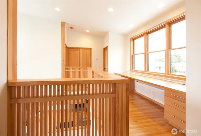 a view of a kitchen with a large window