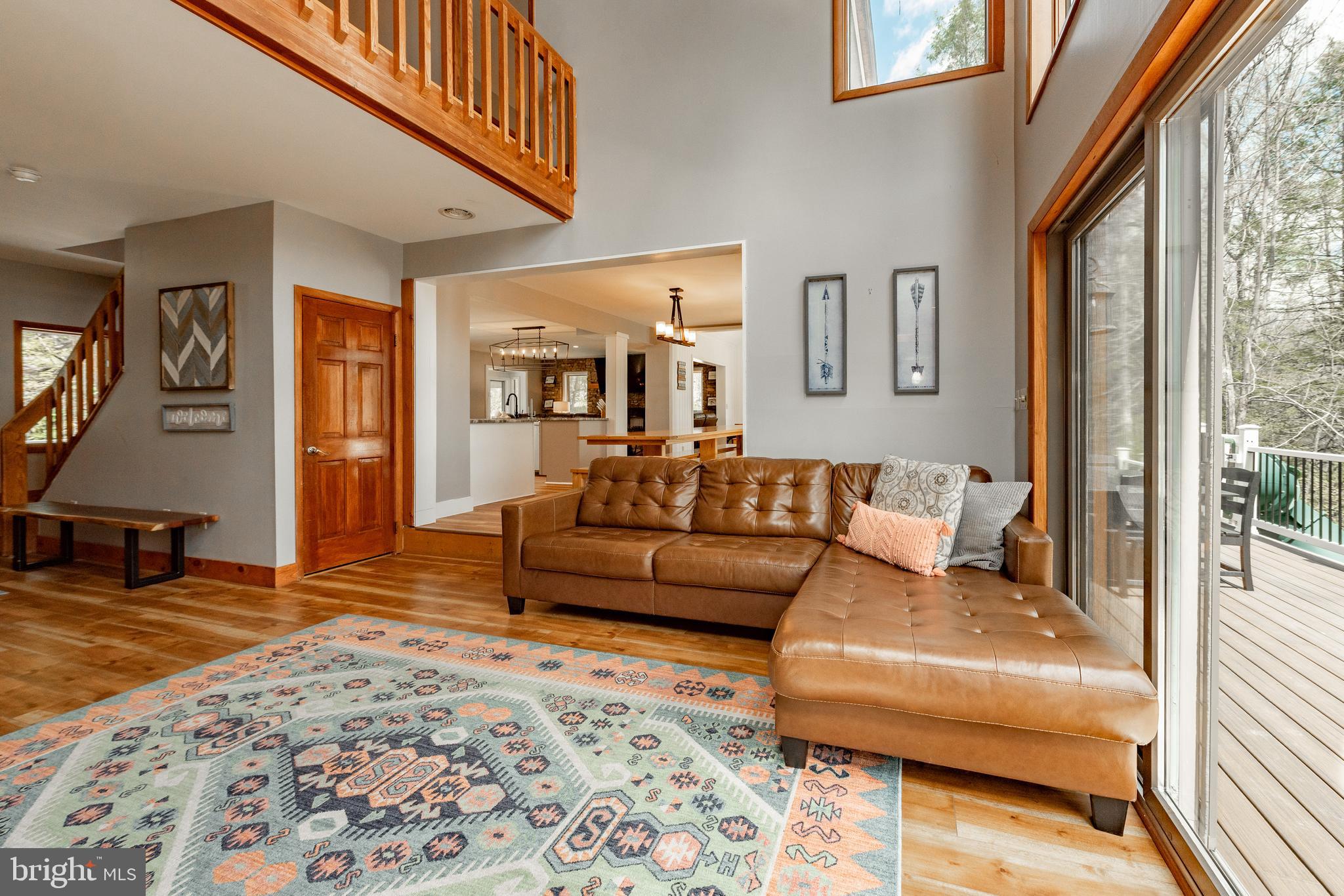 2463 Mayhew Inn Road Oakland, MD 21550 - Photo 24 of 144 a living room with furniture and a rug