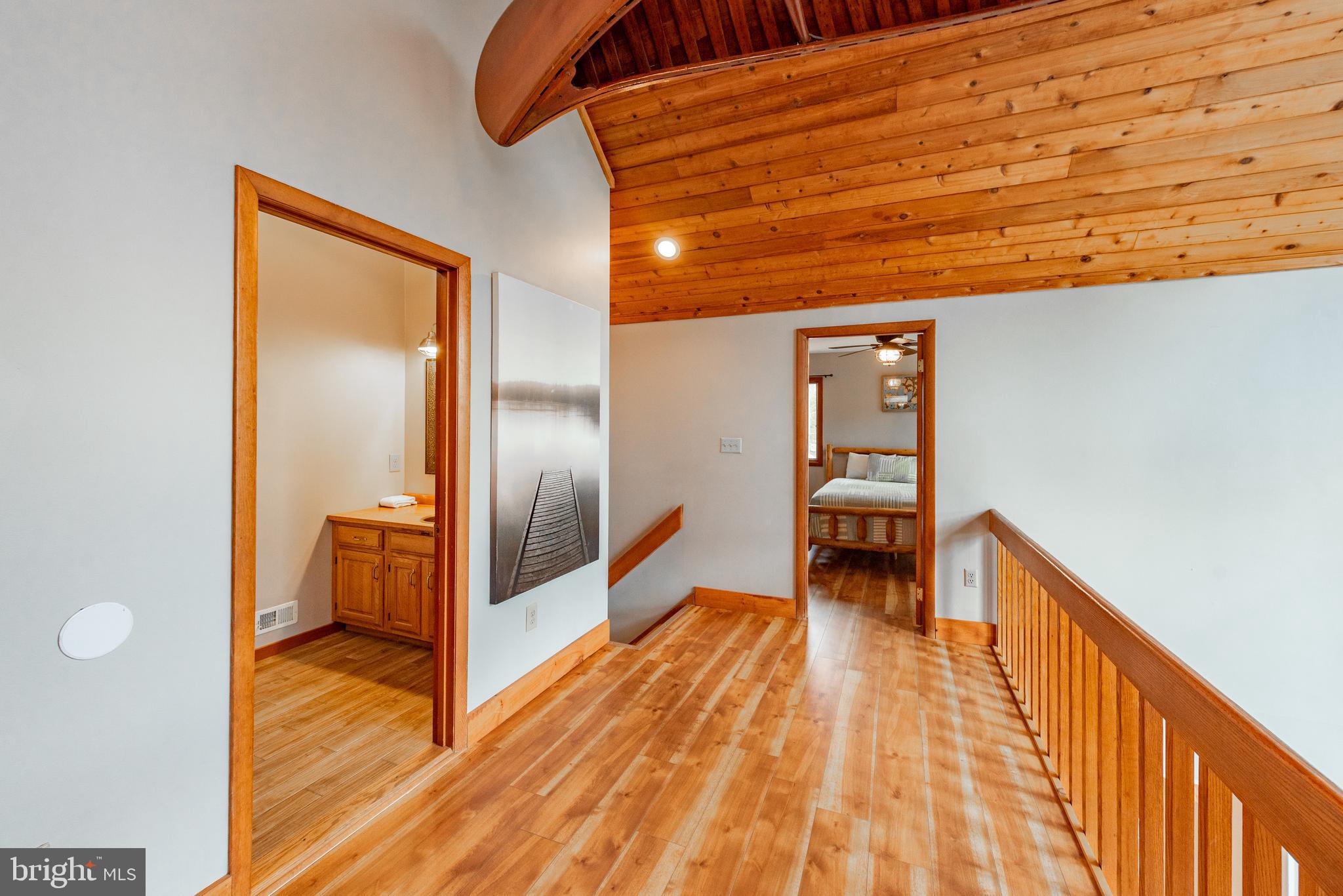 2463 Mayhew Inn Road Oakland, MD 21550 - Photo 45 of 144 a view of a hallway with wooden floor