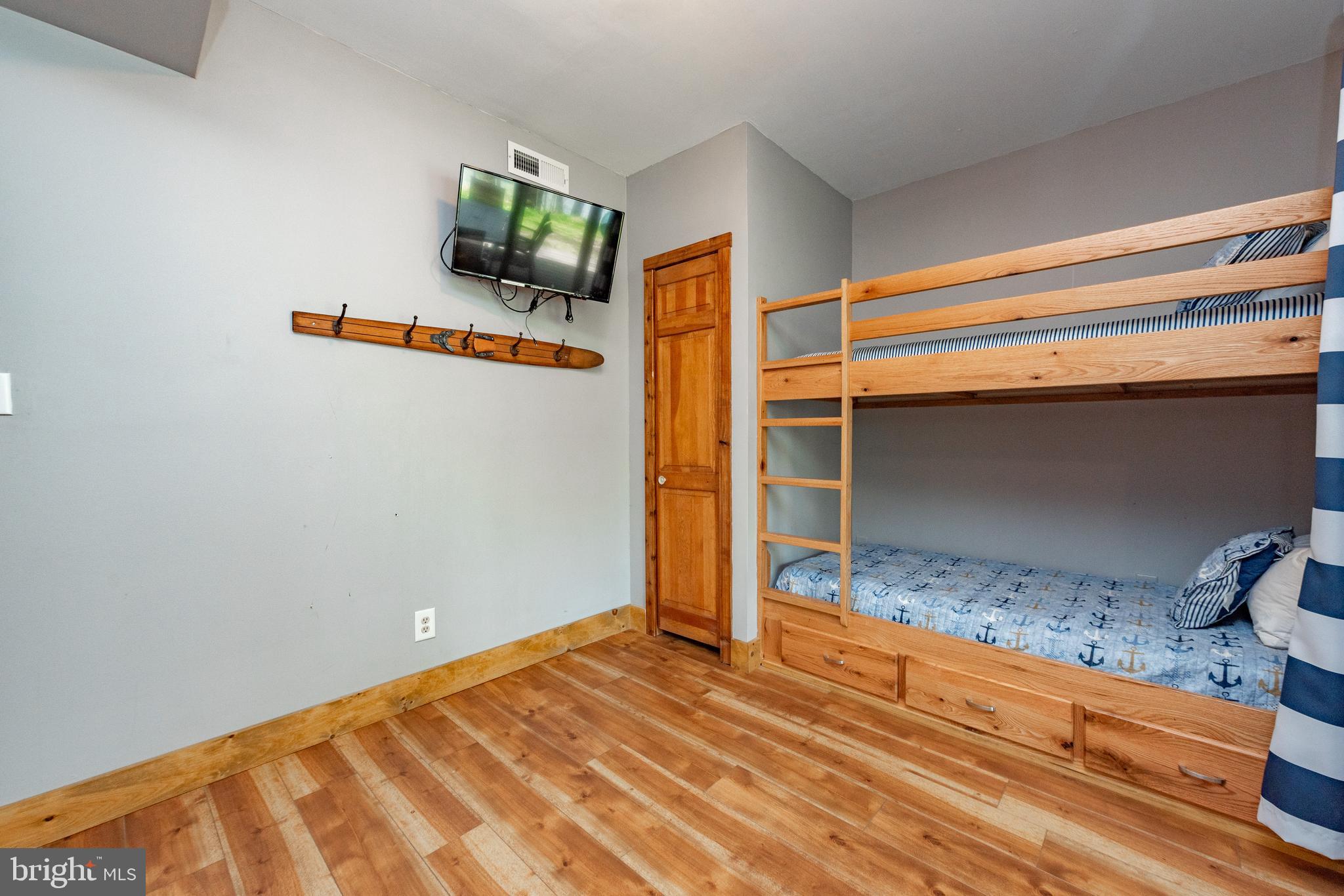 2463 Mayhew Inn Road Oakland, MD 21550 - Photo 73 of 144 a bedroom with a bed and a window
