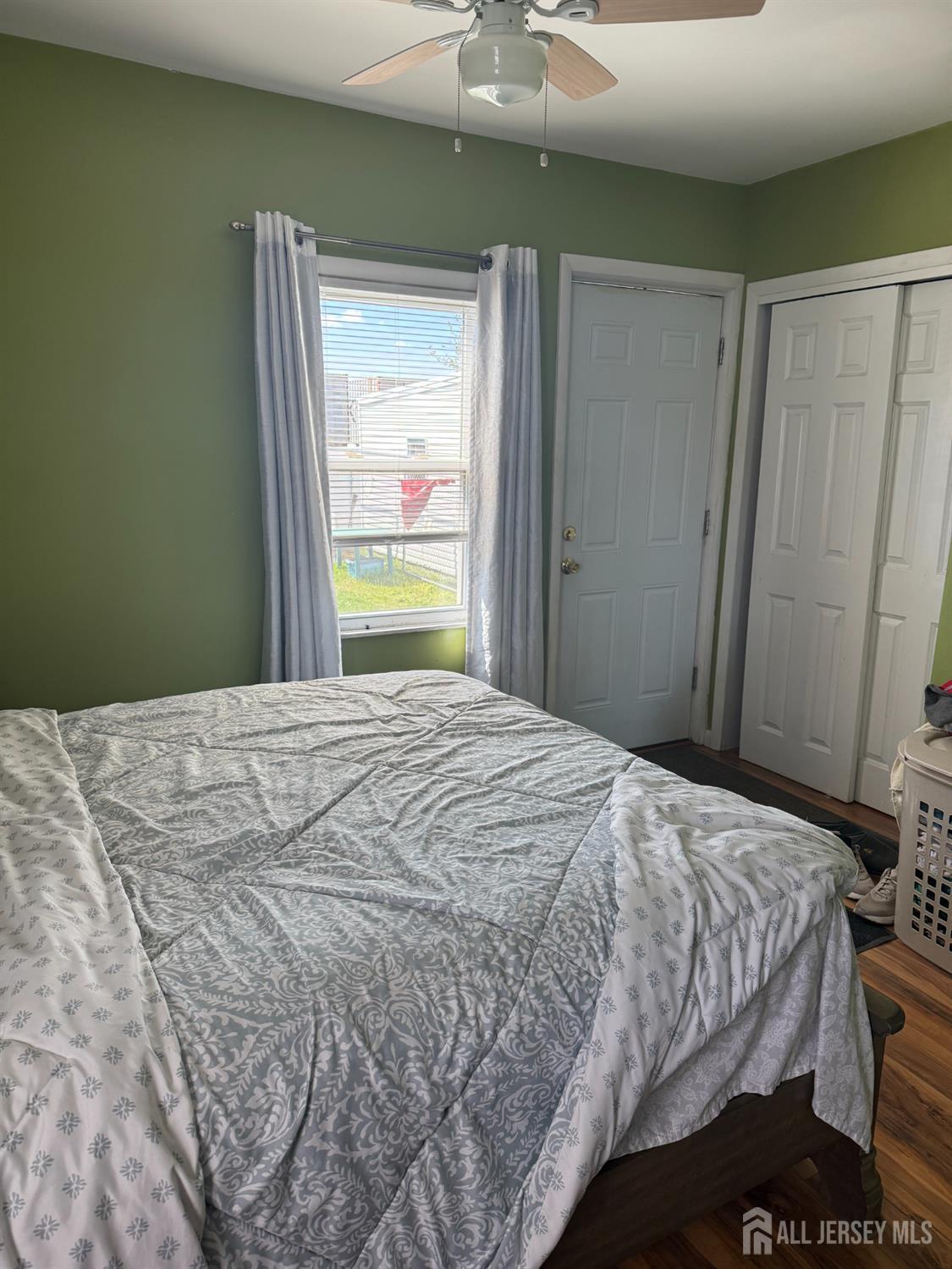 31 Edwin Street Carteret, NJ 07008 - Photo 12 of 18 a bedroom with a bed and a window