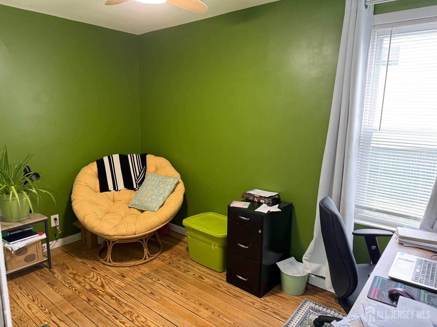 31 Edwin Street Carteret, NJ 07008 - Photo 4 of 18 a view of a room with furniture and wooden floor