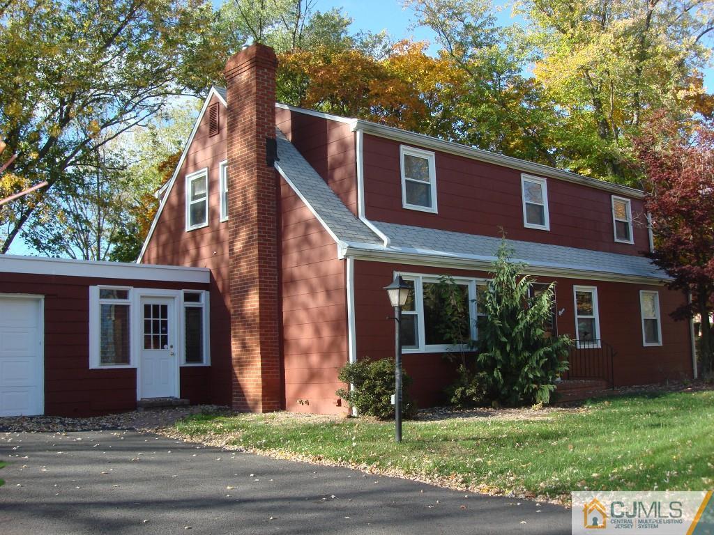 198 Opossum Road Skillman, NJ 08558 - Photo 1 of 25 a front view of a house with a garden