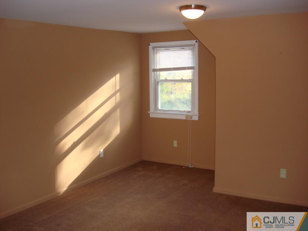 198 Opossum Road Skillman, NJ 08558 - Photo 11 of 25 an empty room with windows