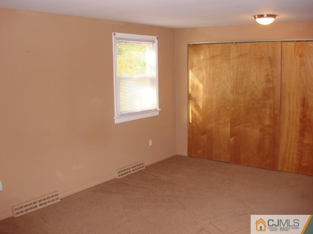 198 Opossum Road Skillman, NJ 08558 - Photo 12 of 25 an empty room with windows