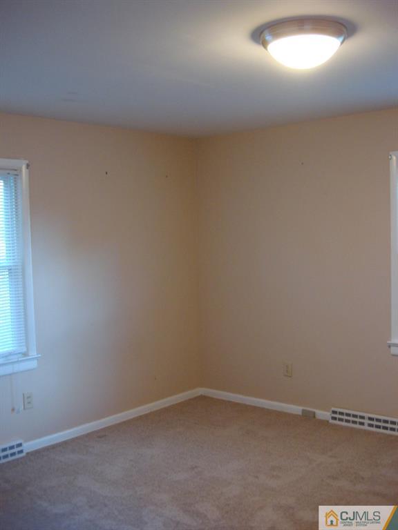 198 Opossum Road Skillman, NJ 08558 - Photo 15 of 25 an empty room with a window