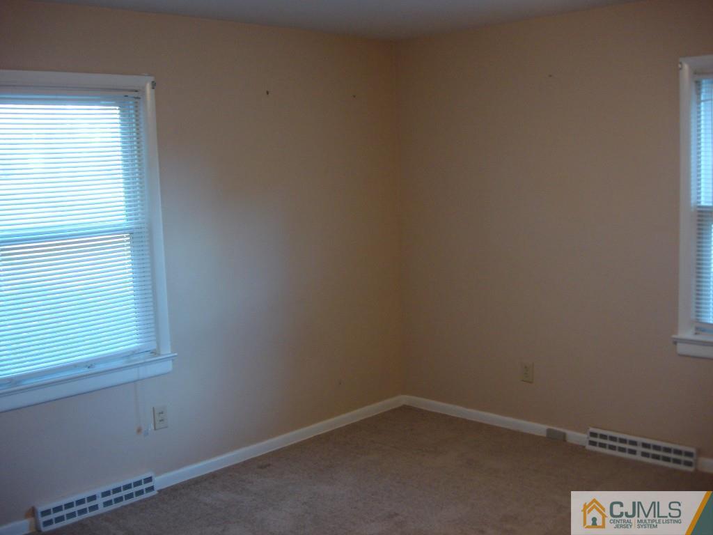 198 Opossum Road Skillman, NJ 08558 - Photo 16 of 25 an empty room with a window