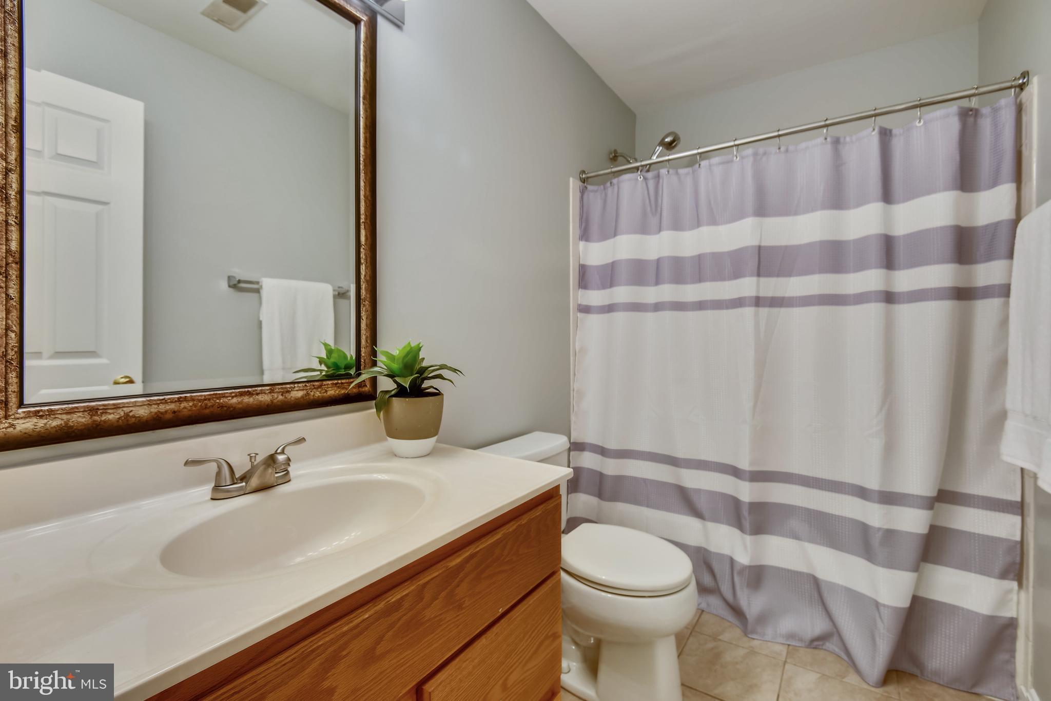 8719 Spring Brook Way Odenton, MD 21113 - Photo 18 of 60 hallway full bath on upper level 1