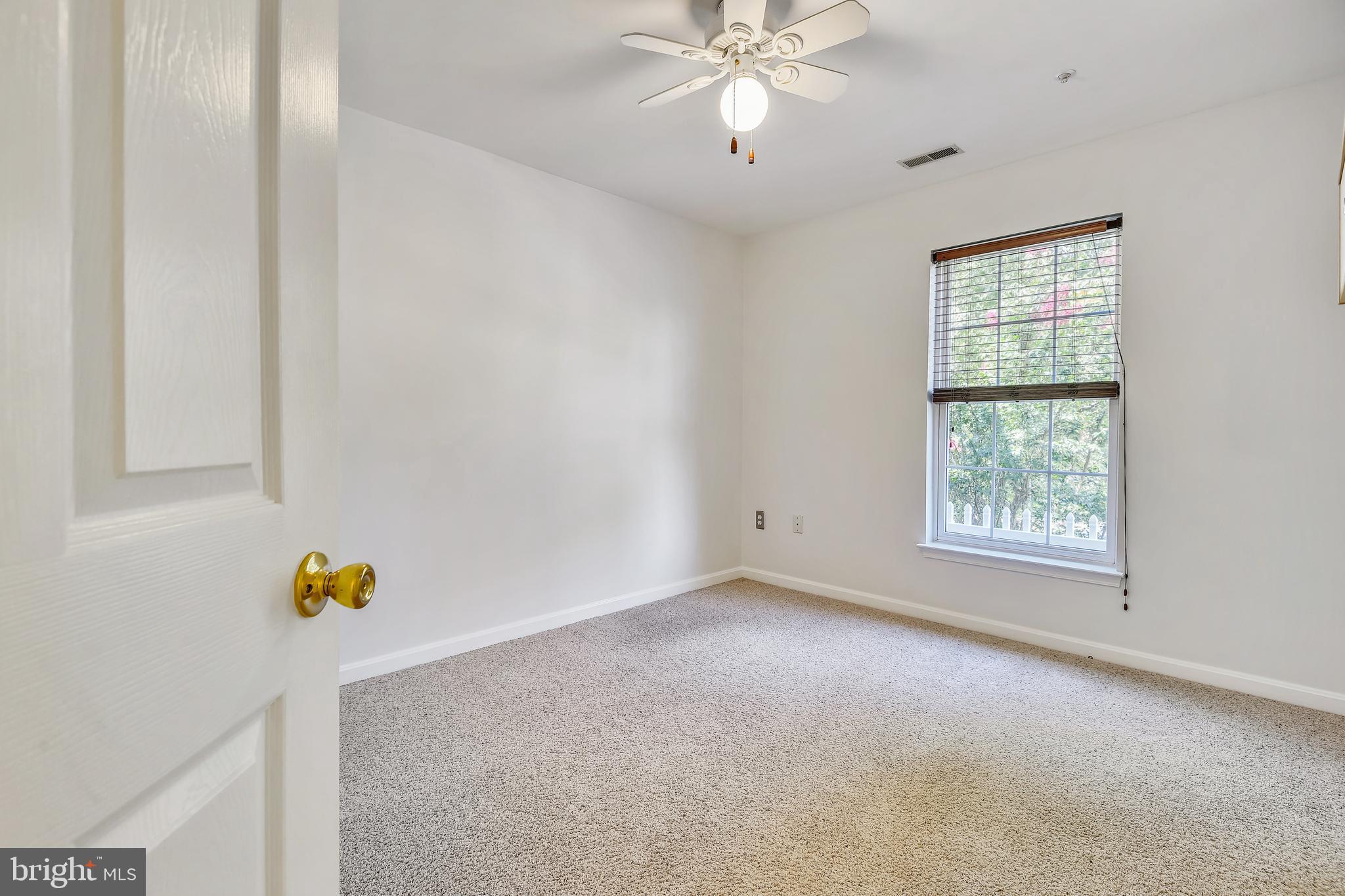 8719 Spring Brook Way Odenton, MD 21113 - Photo 21 of 60 bedroom #2 with ceiling fan and overhead lighting