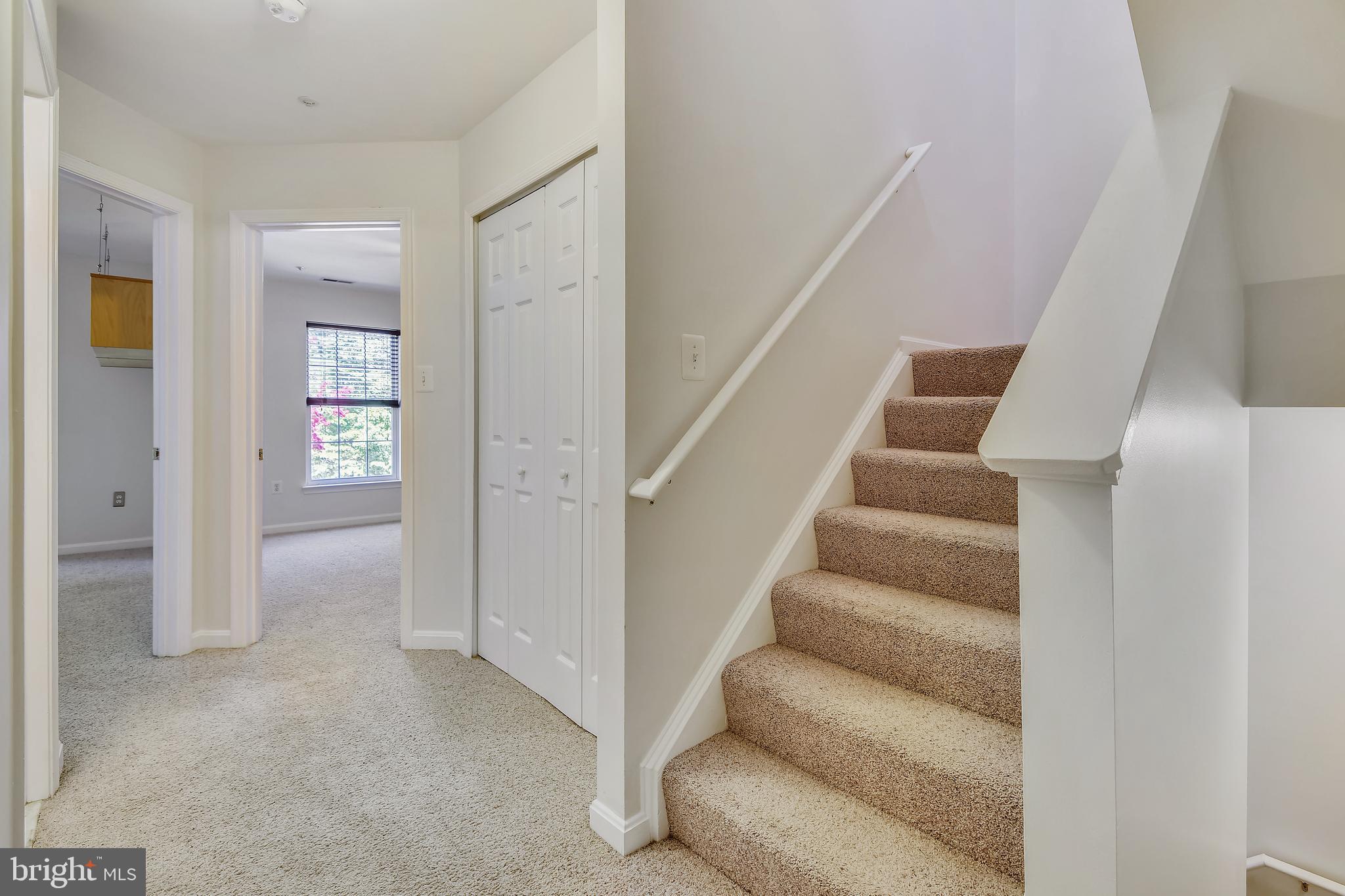 8719 Spring Brook Way Odenton, MD 21113 - Photo 26 of 60 stairs leading to owner's suite on upper lvl 2