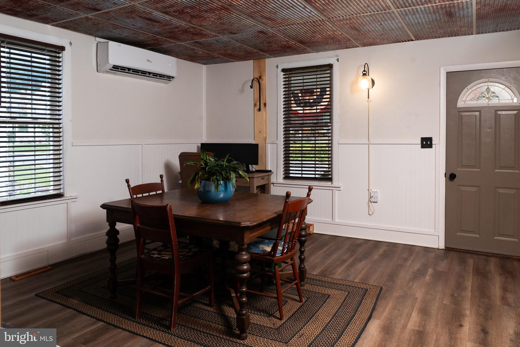 420 Locust Street Burnham, PA 17009 - Photo 11 of 59 a view of a dining room with furniture and wooden floor
