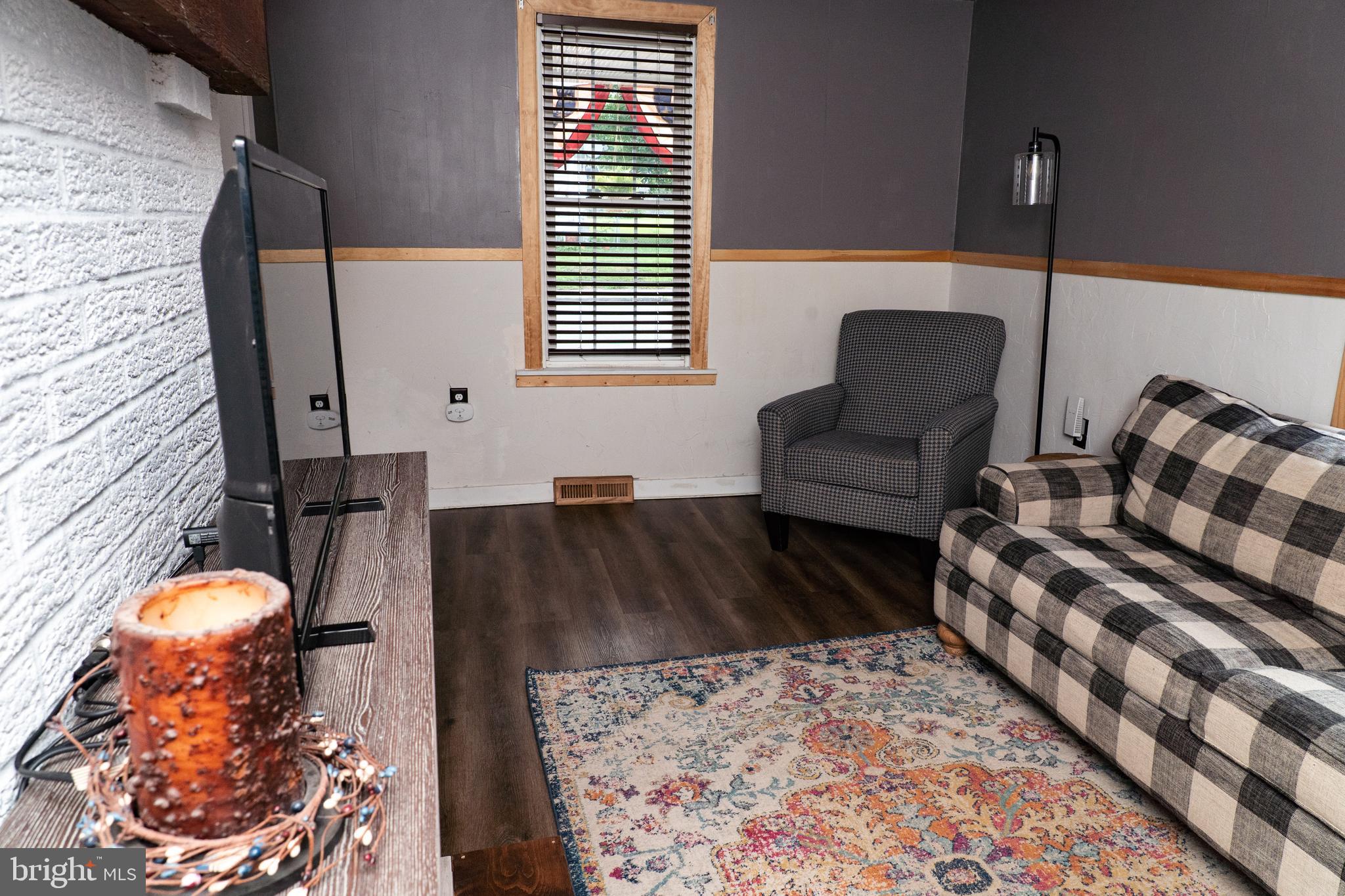 420 Locust Street Burnham, PA 17009 - Photo 14 of 59 a living room with furniture and a rug