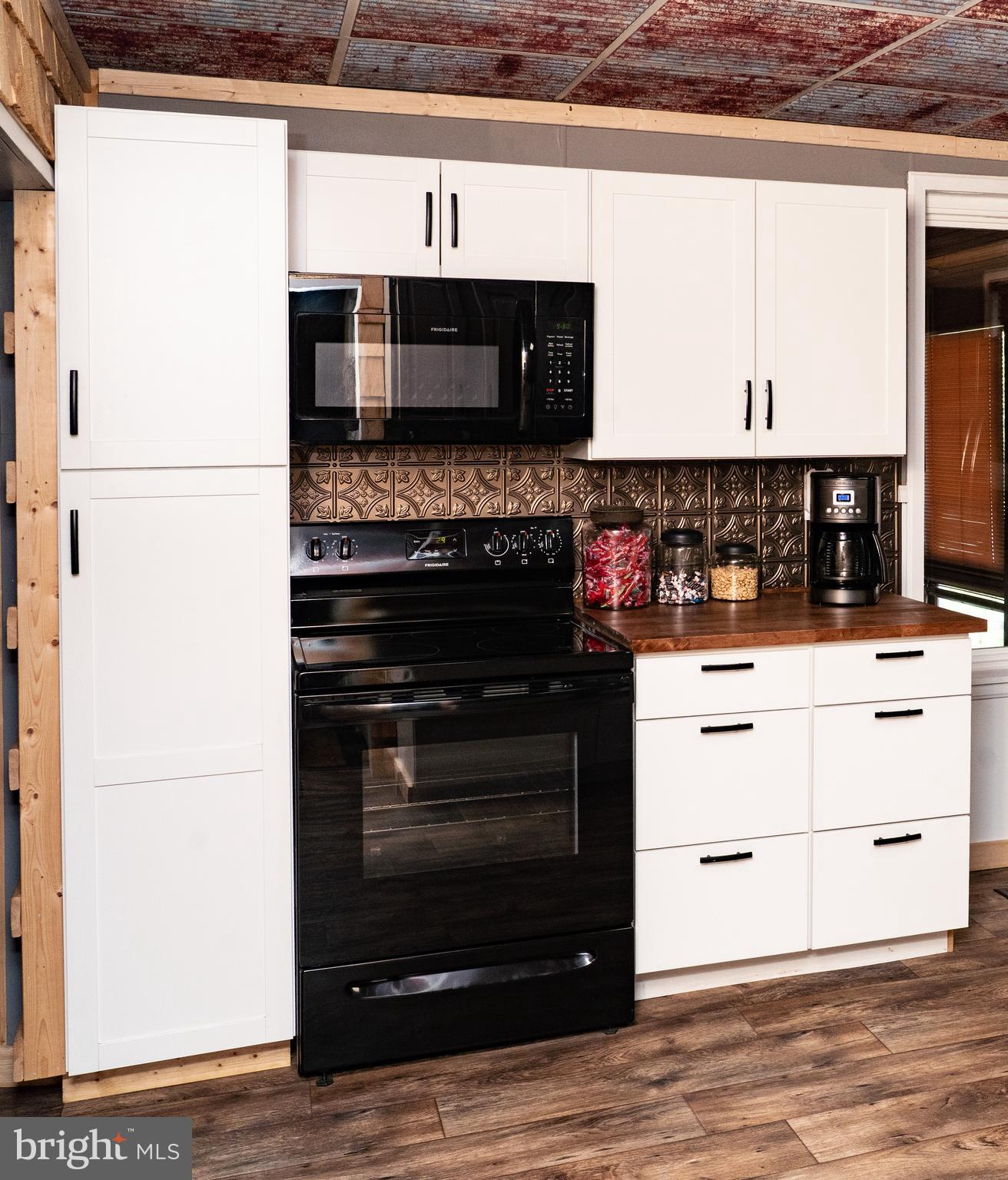 420 Locust Street Burnham, PA 17009 - Photo 20 of 59 a kitchen with stainless steel appliances a stove and a microwave