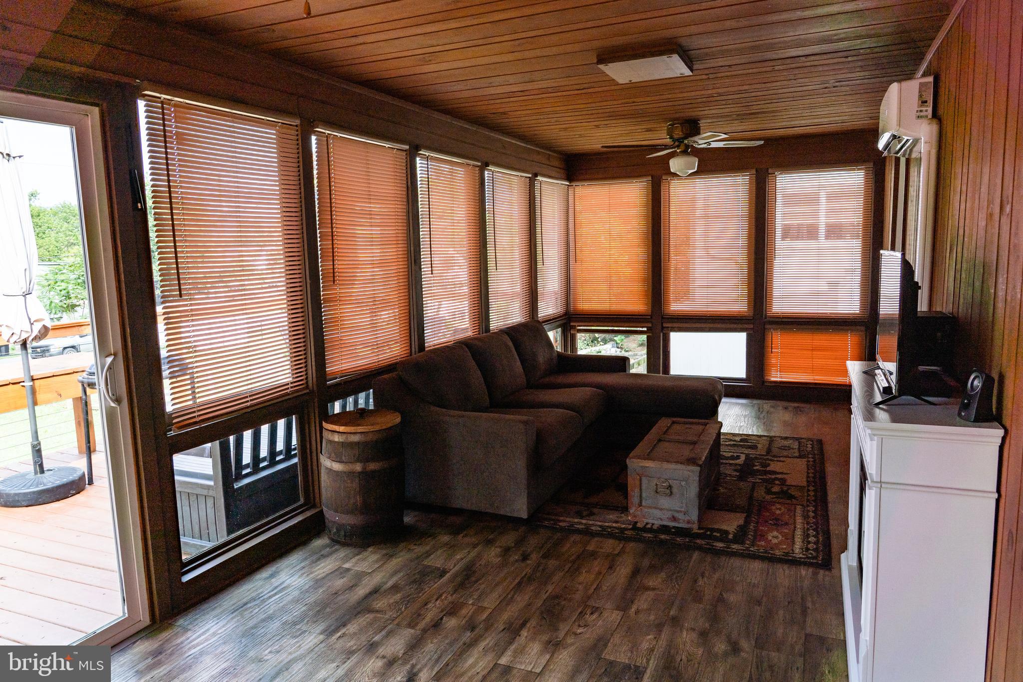 420 Locust Street Burnham, PA 17009 - Photo 28 of 59 a living room with furniture and a large window