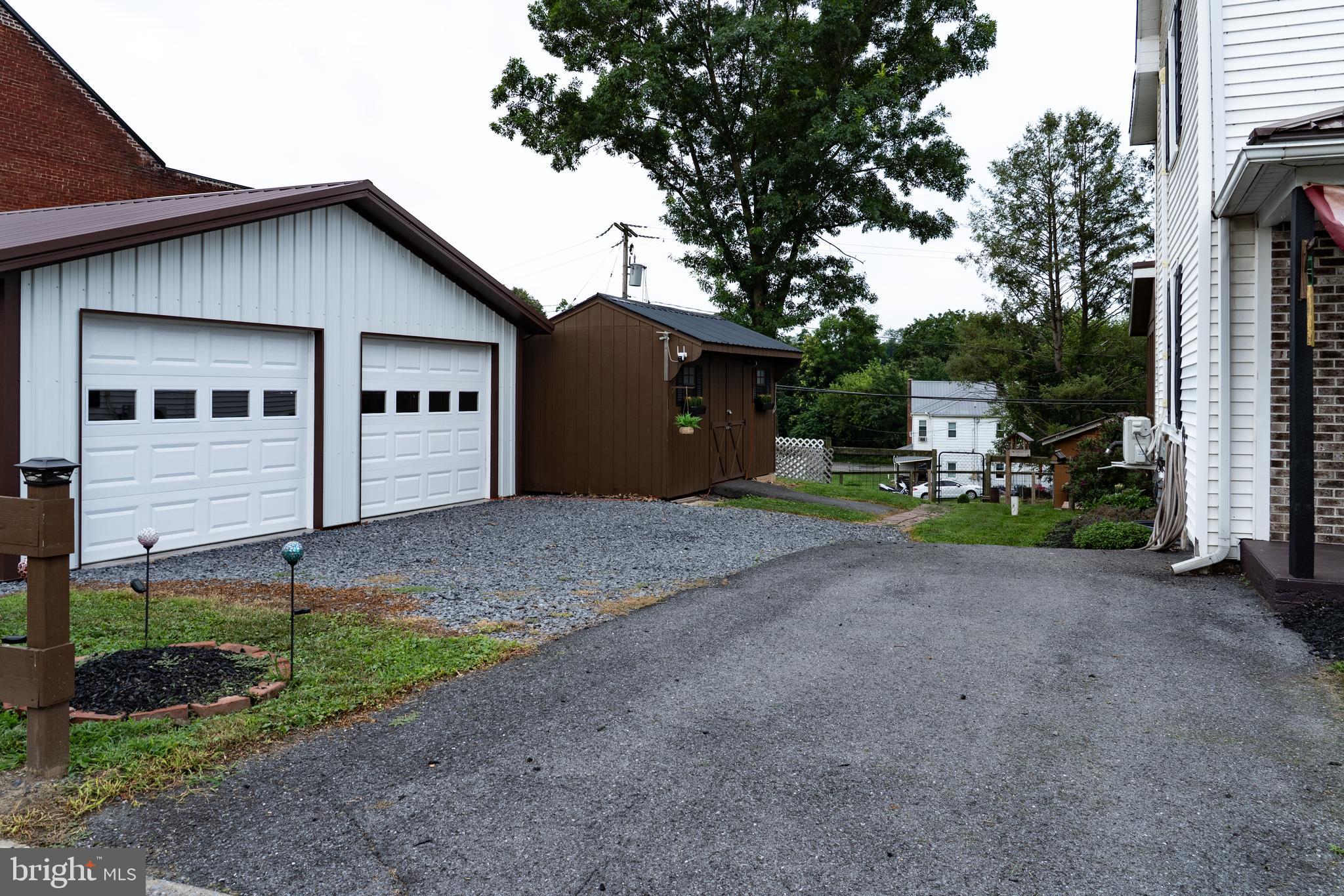 420 Locust Street Burnham, PA 17009 - Photo 59 of 59 a front view of a house with garden