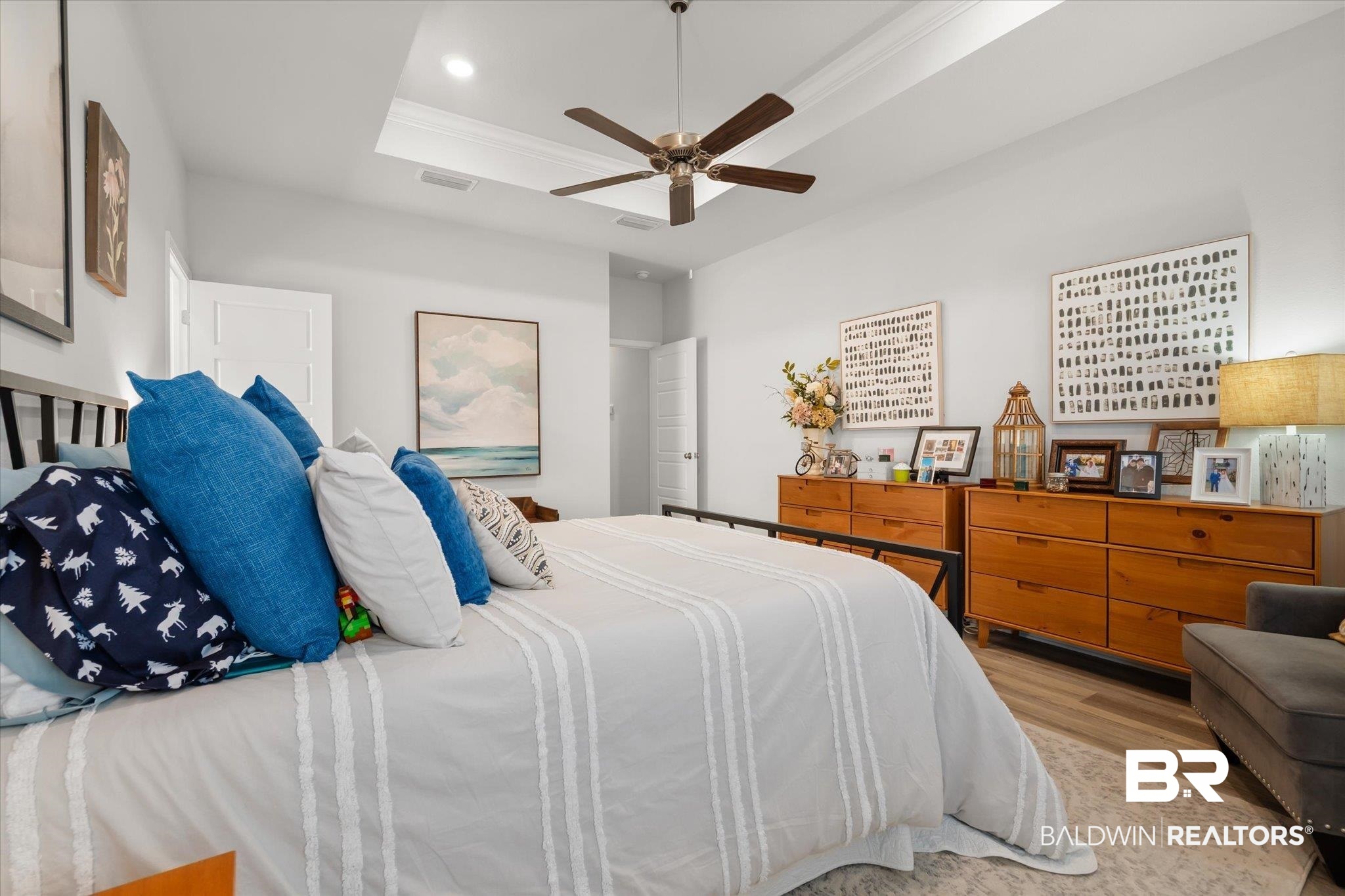 1167 Provision Road Mobile, AL 36608 - Photo 10 of 20 Bedroom with visible vents, ornamental molding, recessed lighting, wood finished floors, and a raised ceiling
