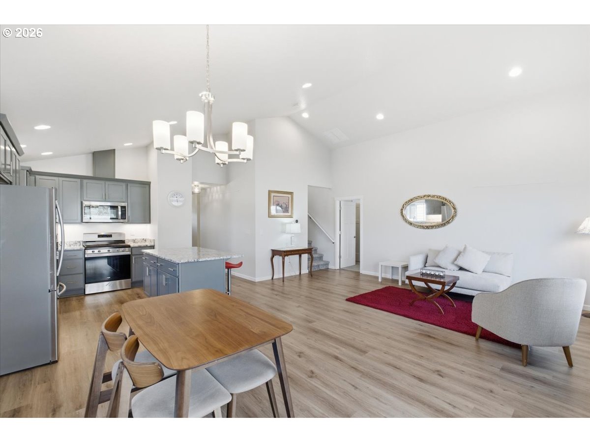 2046 Southeast Academy Street Dallas, OR 97338 - Photo 11 of 47 a living room with kitchen view and kitchen view
