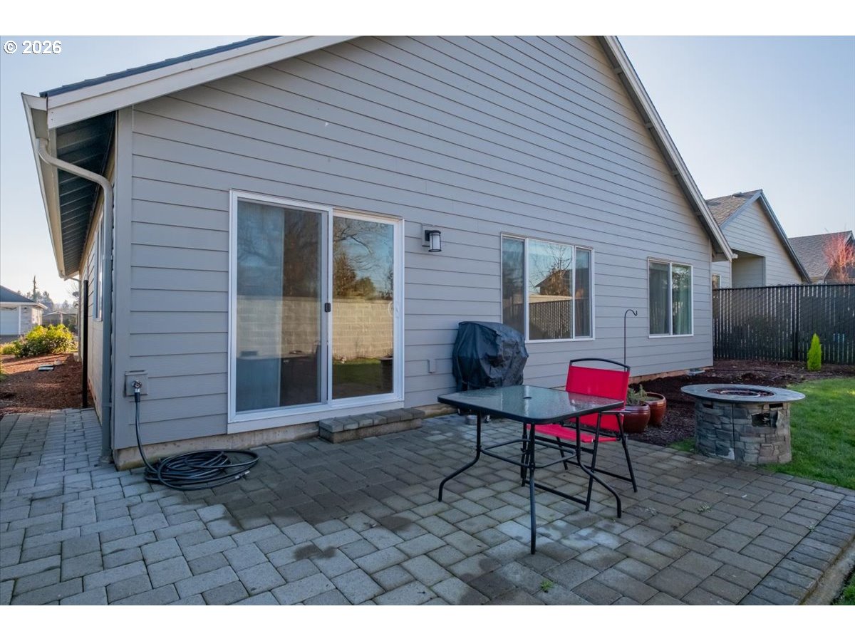 2046 Southeast Academy Street Dallas, OR 97338 - Photo 46 of 47 a view of a house with backyard and sitting area