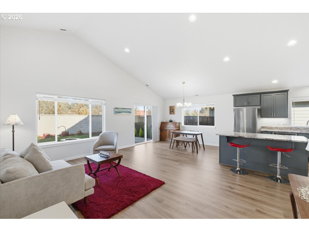 2046 Southeast Academy Street Dallas, OR 97338 - Photo 10 of 47 a living room with furniture and a wooden floor