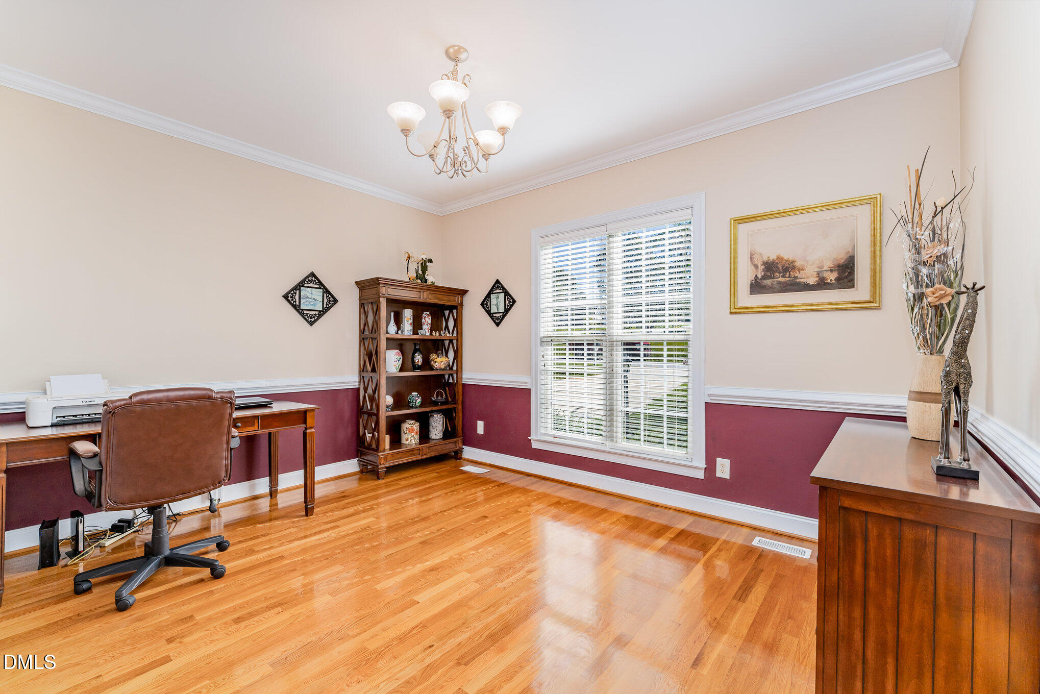 272 Travel Lite Drive Raleigh, NC 27603 - Photo 11 of 30 a view of a livingroom with furniture window and wooden floor