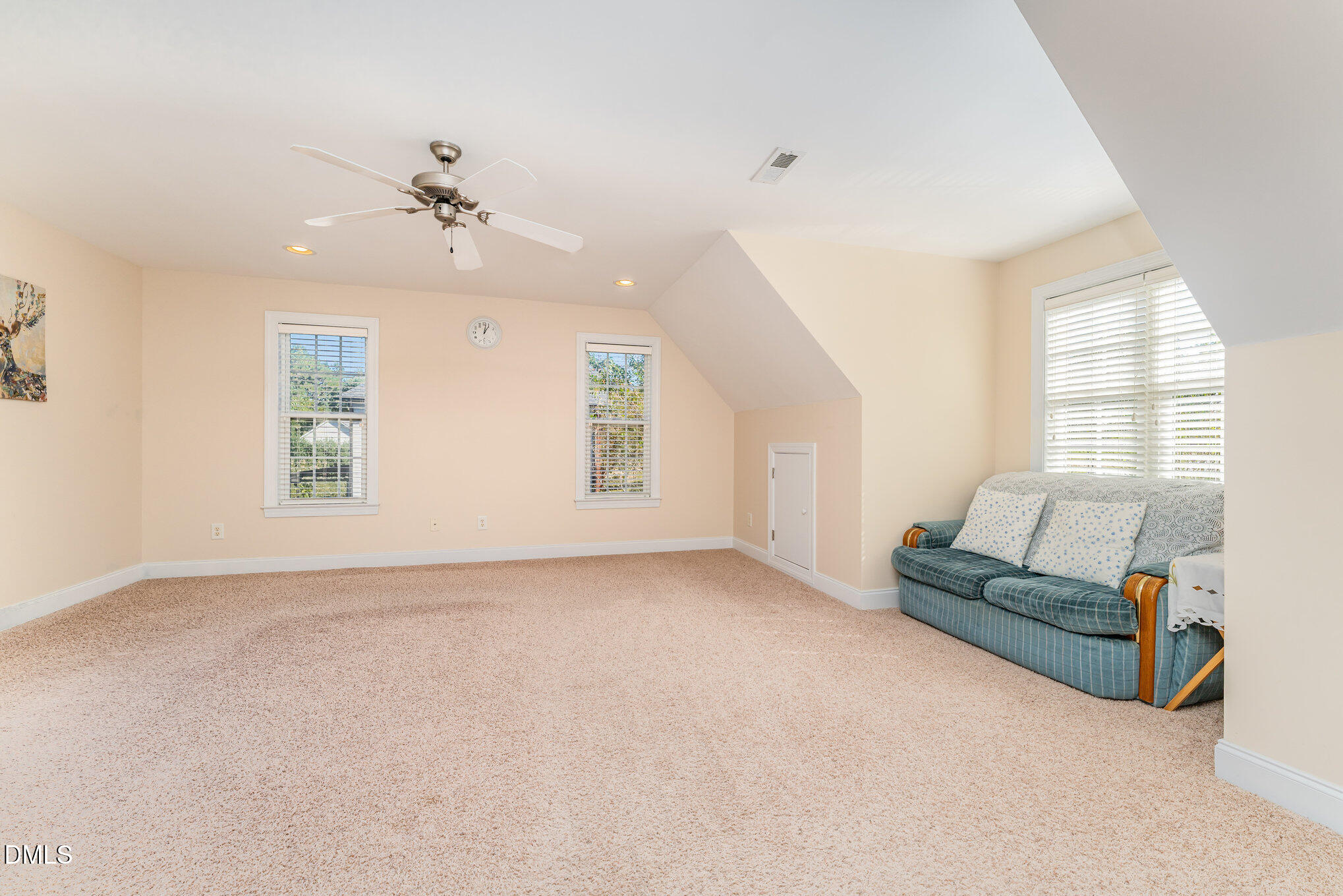 272 Travel Lite Drive Raleigh, NC 27603 - Photo 13 of 30 a living room with furniture and a window