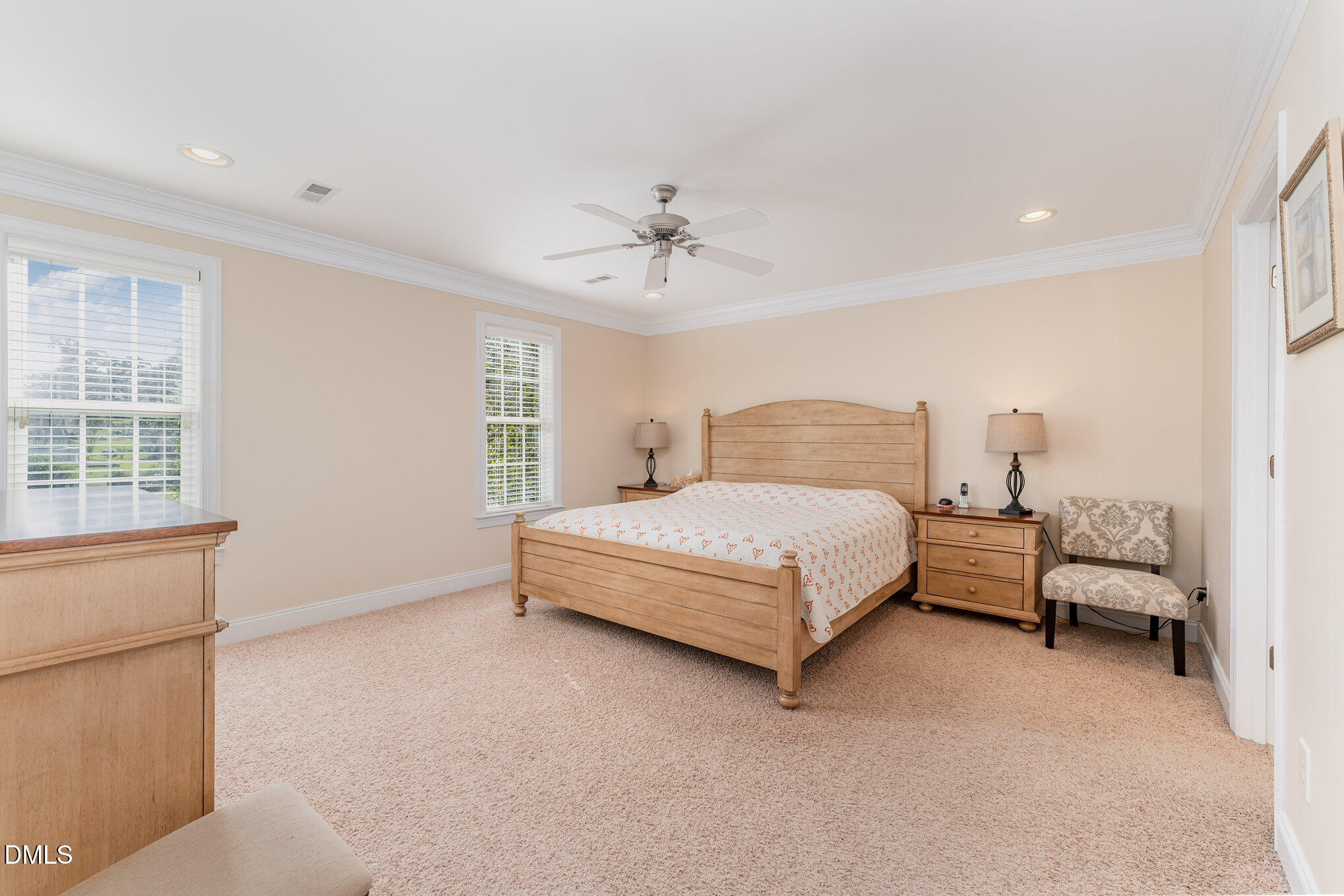 272 Travel Lite Drive Raleigh, NC 27603 - Photo 17 of 30 a bedroom with a bed and a window